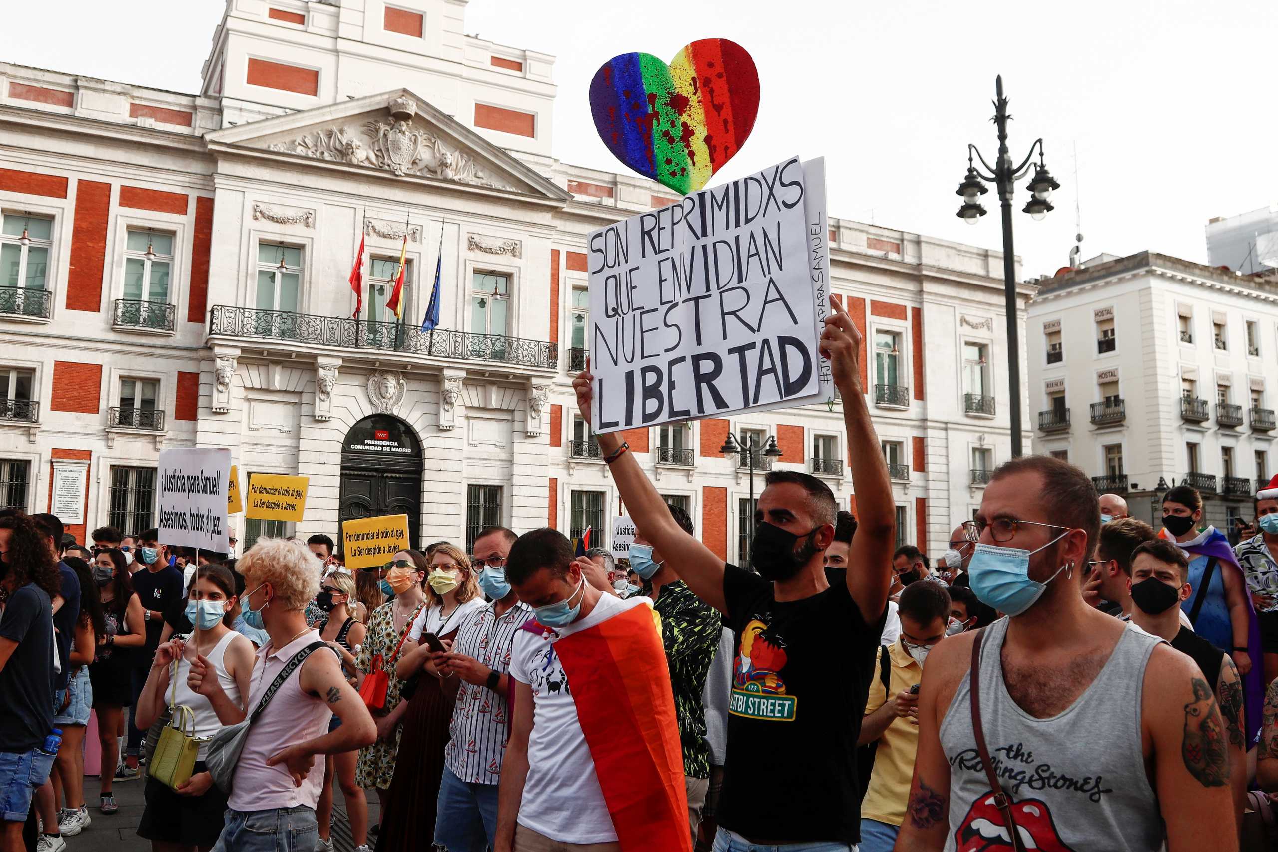 LGBT+ activists protest against homophobic crimes, following the murder of Samuel Luiz, who was attacked outside a club in A Coruna, in Madrid, Spain, July 11, 2021. REUTERS