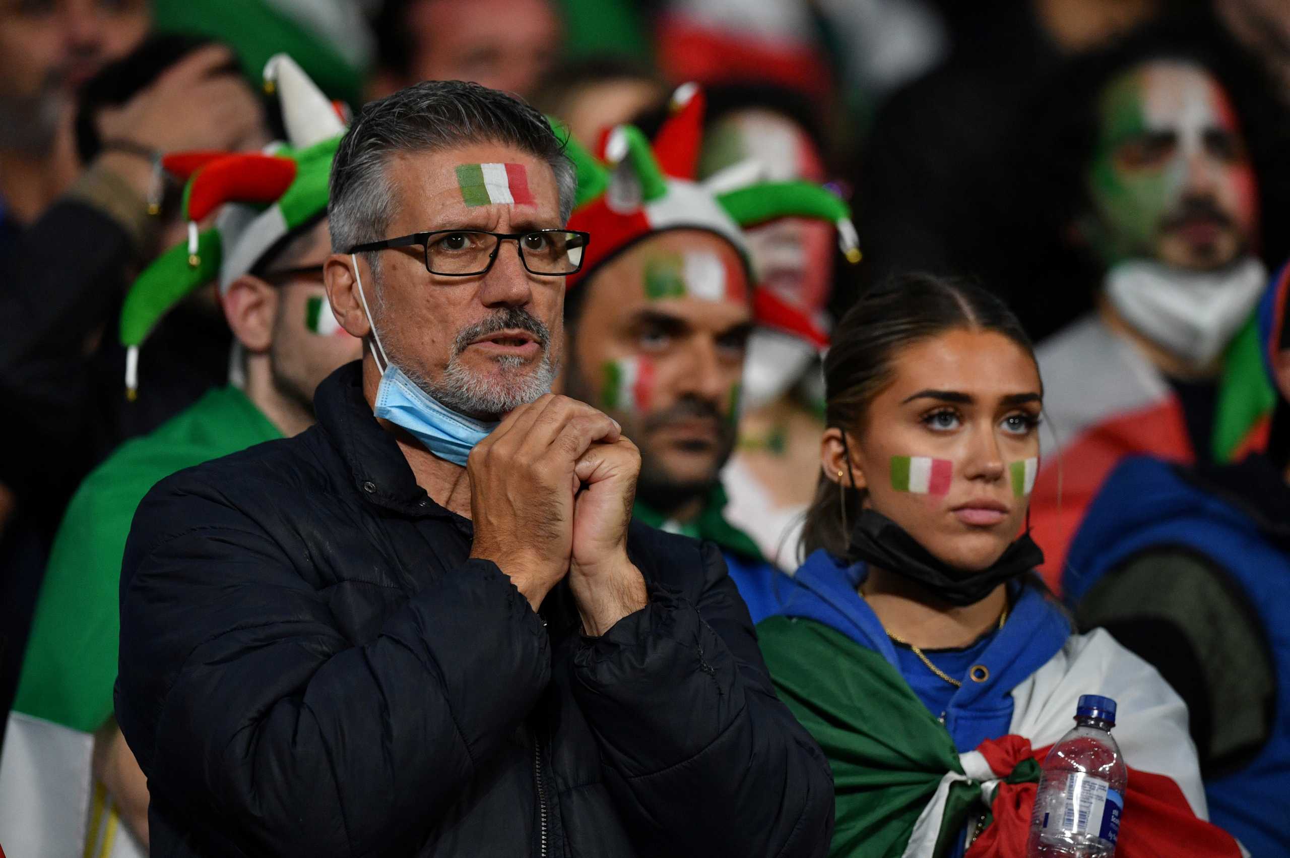 FILE PHOTO: Soccer Football - Euro 2020 - Semi Final - Italy v Spain - Wembley Stadium, London, Britain - July 6, 2021 Italy fans during the penalty shoot-out Pool via REUTERS
