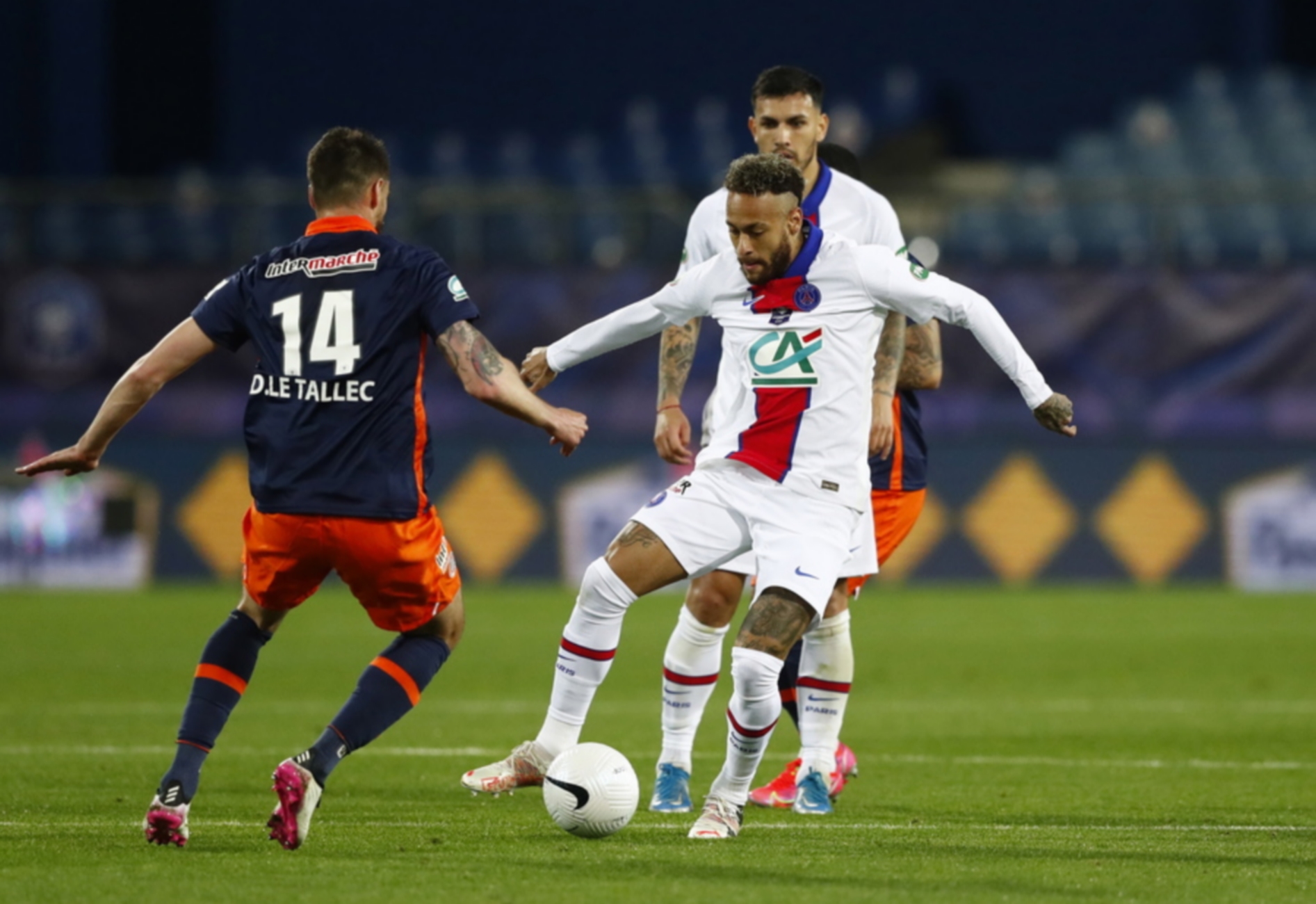 epa09195292 Damian Le Tallec (L) of Montpellier HSC and Neymar (R) of Paris Saint Germain in action during the Coupe de France semi final soccer match between Montpellier HSC and Paris Saint Germain, in Montpellier, France, 12 May 2021.  EPA