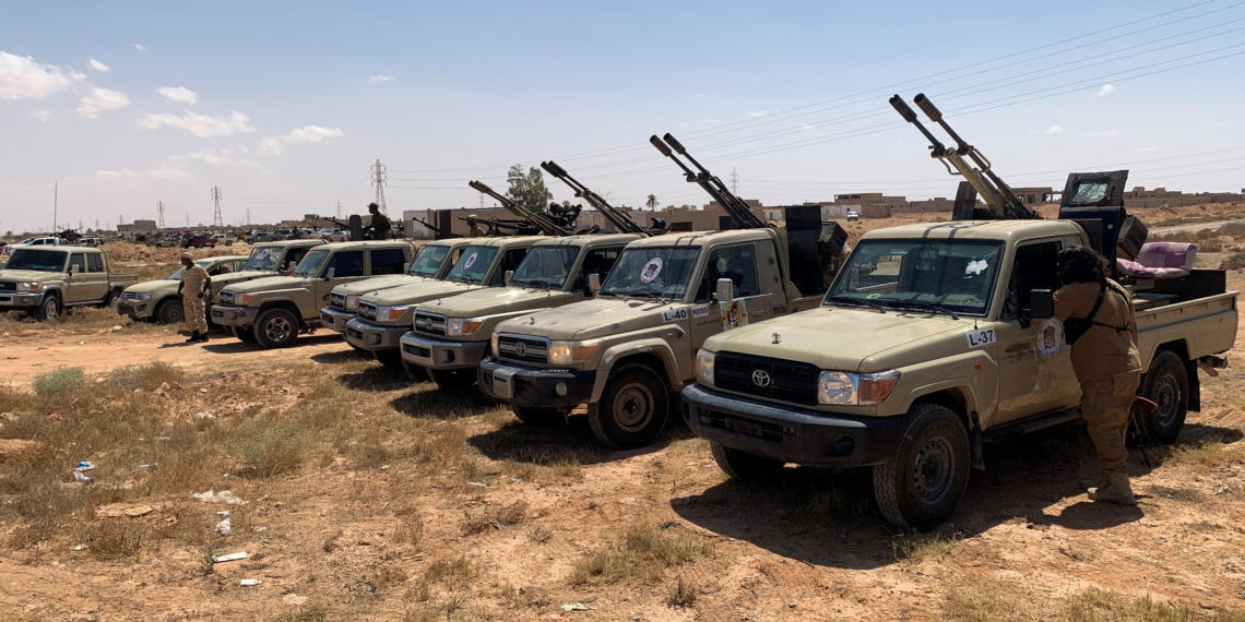 Troops loyal to Libya's internationally recognized government are seen in military vehicles as they prepare before heading to Sirte, on the outskirts of Misrata, Libya, July 18, 2020. REUTERS