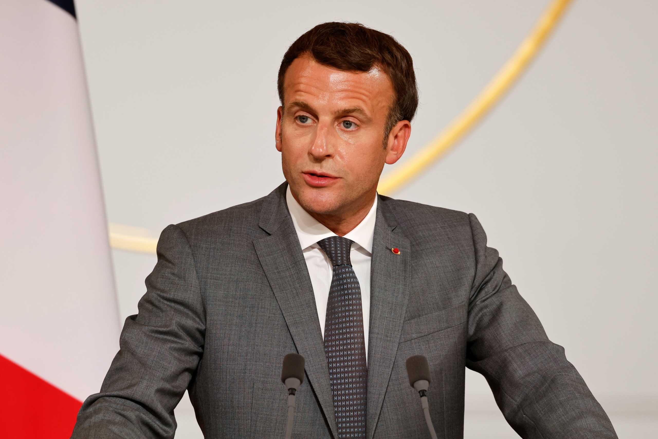 French President Emmanuel Macron delivers a speech during a ceremony to award Veteran American civil rights activist Reverend Jesse Jackson with the Legion of Honour at the Elysee Palace in Paris, July 19, 2021. Ludovic Marin