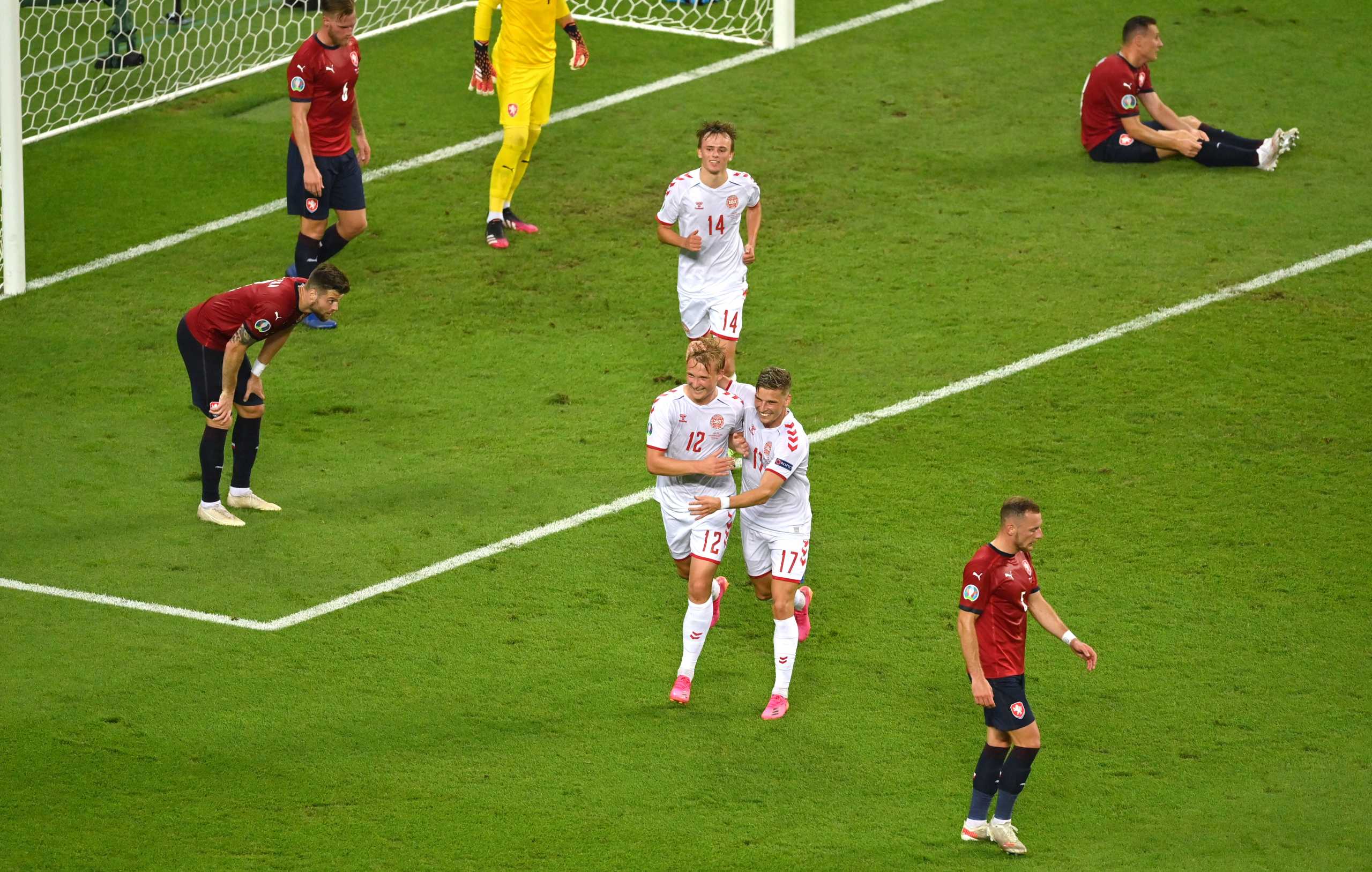 Soccer Football - Euro 2020 - Quarter Final - Czech Republic v Denmark - Baku Olympic Stadium, Baku, Azerbaijan - July 3, 2021 Denmark's Kasper Dolberg celebrates scoring their second goal with Jens Stryger Larsen Pool via REUTERS