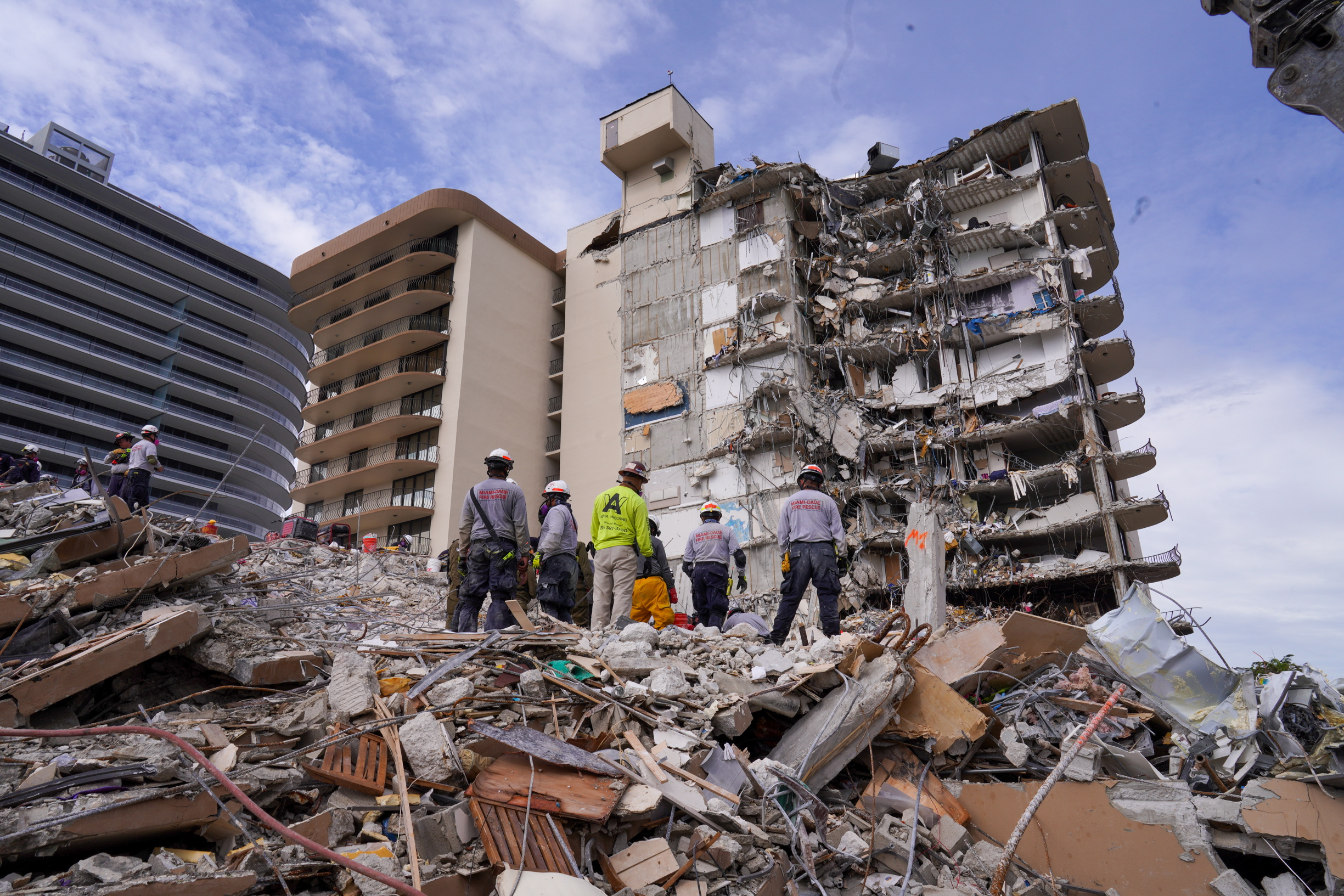 Search and rescue personnel work at the site of a collapsed Florida condominium complex in Surfside, Miami, U.S., in this handout image July 2, 2021. MIAMI DADE FIRE DEPARTMENT
