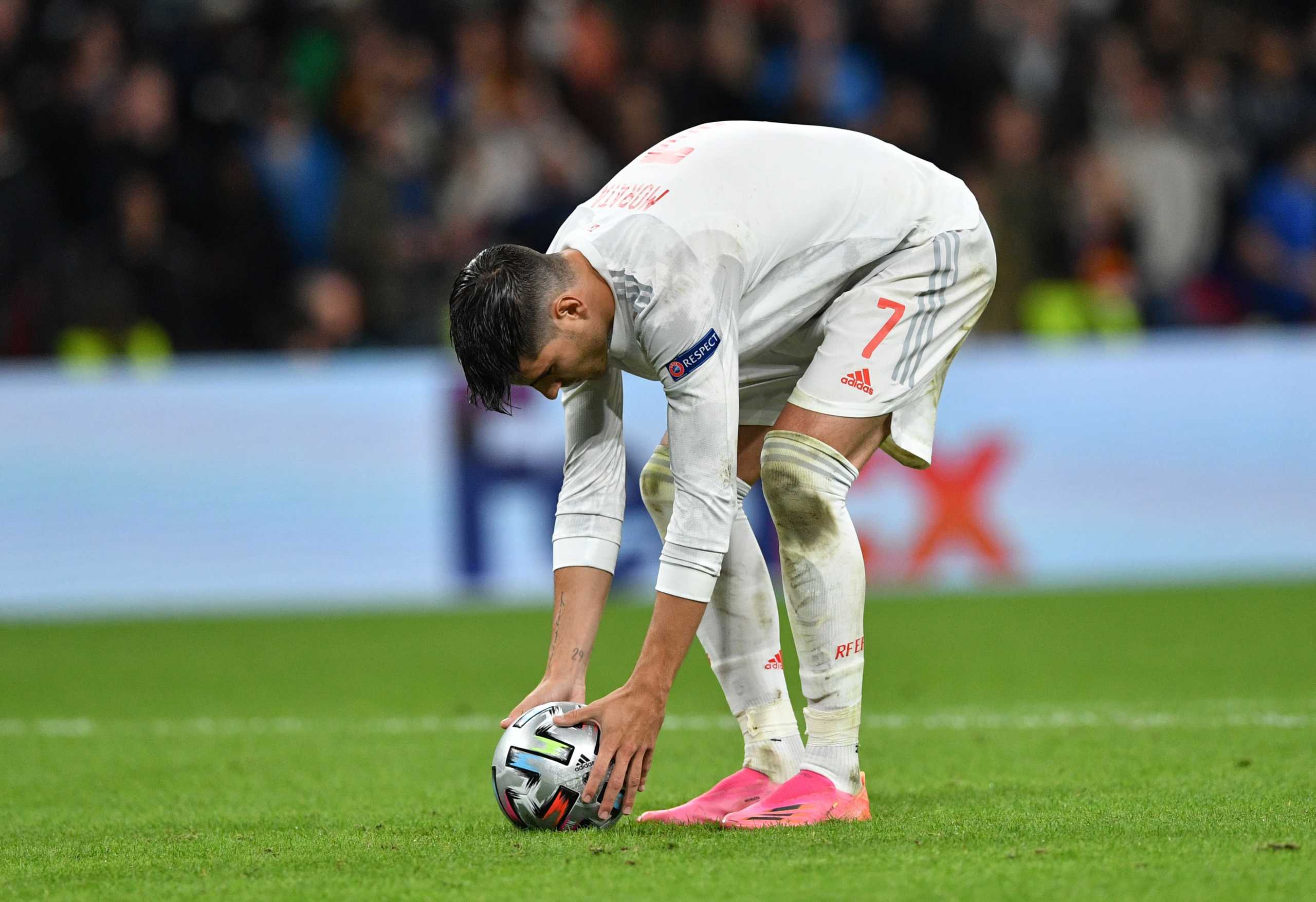 Soccer Football - Euro 2020 - Semi Final - Italy v Spain - Wembley Stadium, London, Britain - July 6, 2021 Spain's Alvaro Morata prepares to take his penalty before he has his shot saved by Italy's Gianluigi Donnarumma during the shoot-out Pool via REUTERS