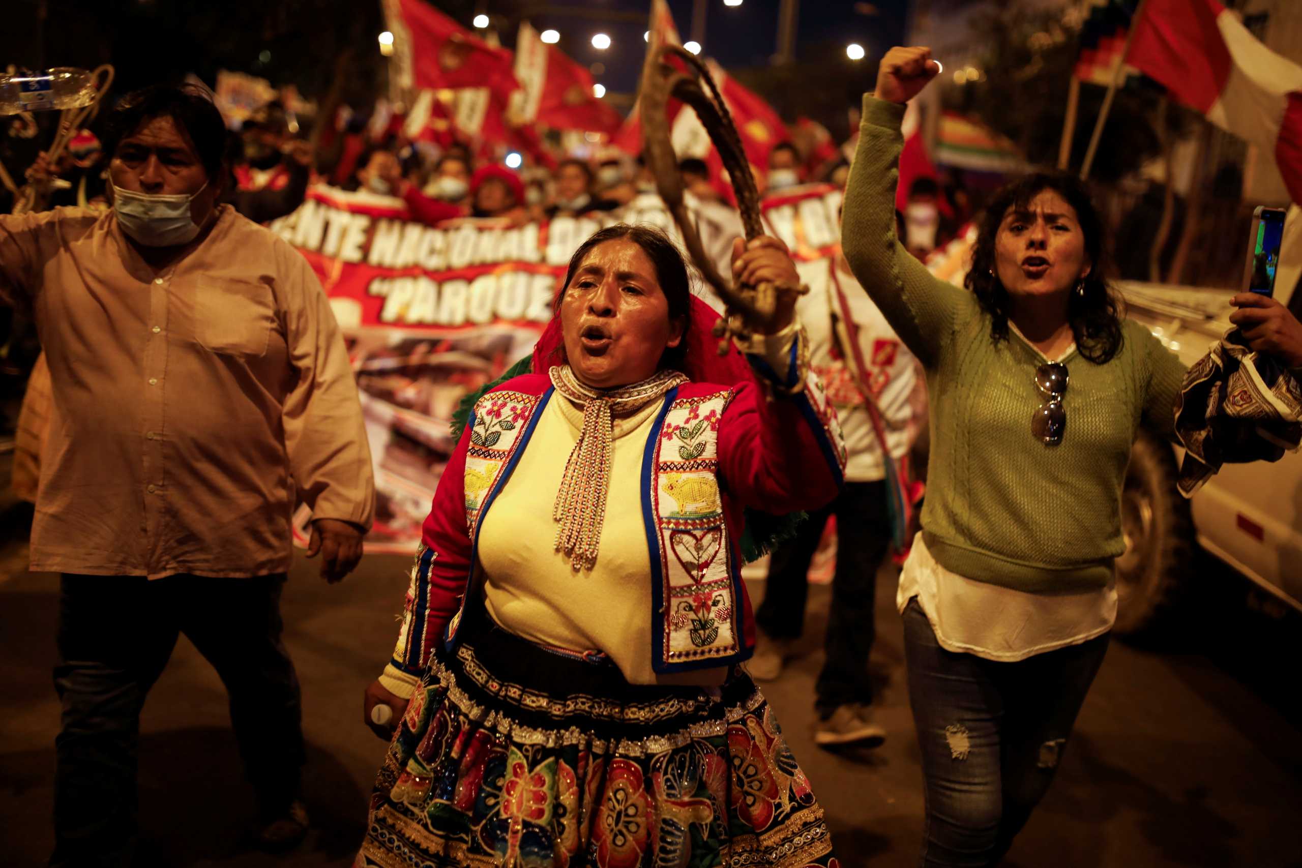 Supporters of Presidential candidate Pedro Castillo protest against the uncertainty, over the result of the presidential elections held a month ago, in Lima, Peru, July 6, 2021. REUTERS