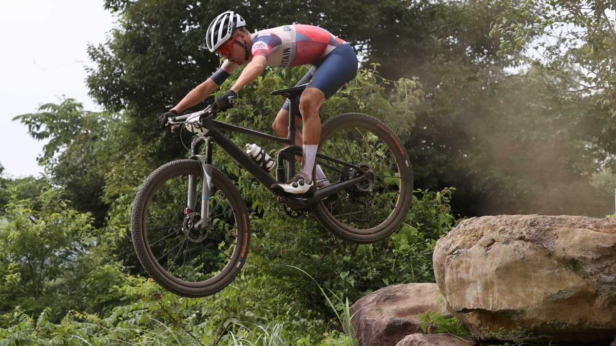 Tokyo 2020 Olympics - Mountain Bike - Men's Cross Country - Final - Izu MTB Course - Shizuoka, Japan - July 26, 2021.  Tom Pidcock of Britain in action. REUTERS