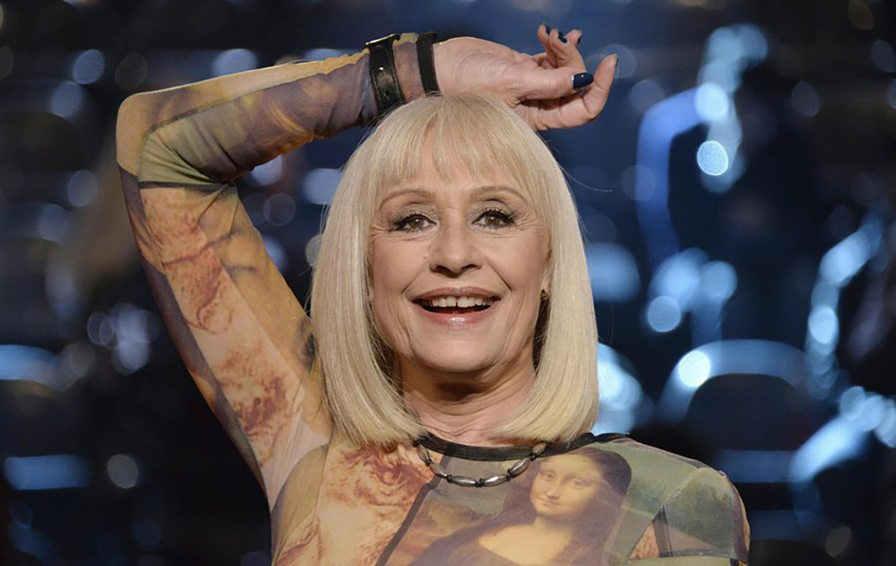epa04118878 Italian singer and TV presenter Raffaella Carra performs during the second edition of TV show 'The voice of Italy', Milan, Italy, 10 March 2014.  EPA