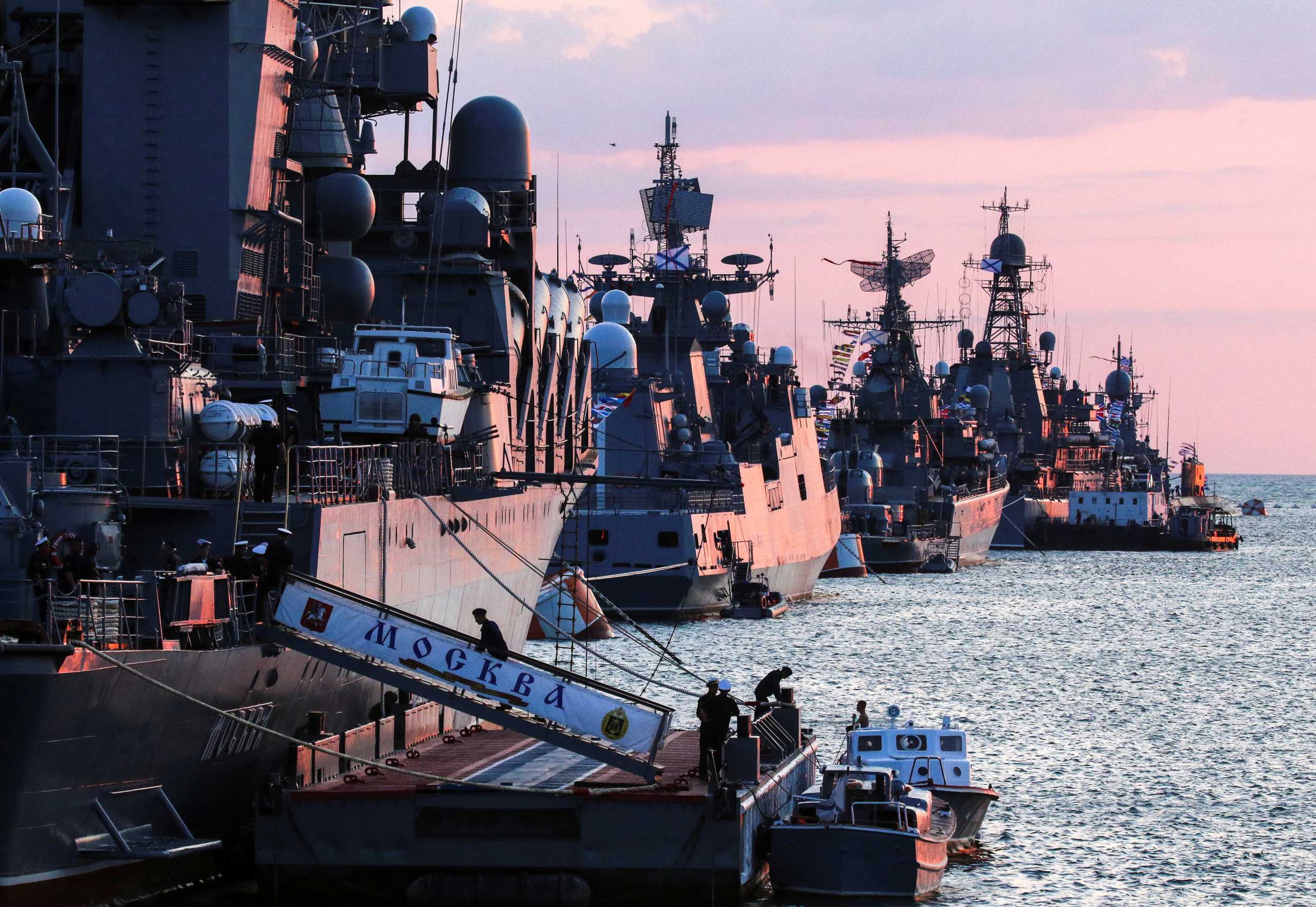 Russian warships are seen ahead of the Navy Day parade in the Black Sea port of Sevastopol, Crimea July 23, 2021. REUTERS