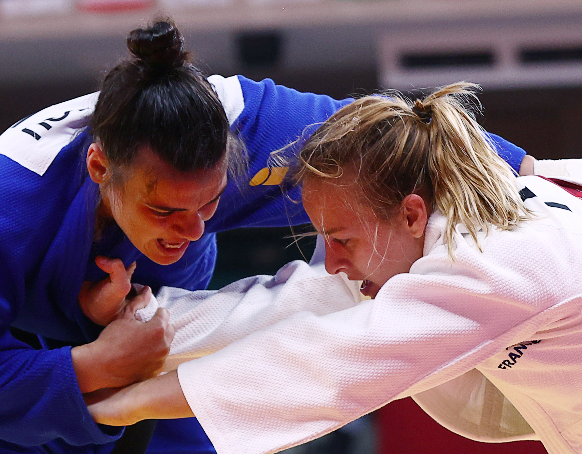 Tokyo 2020 Olympics - Judo - Women's 70kg - Last 16 - Nippon Budokan - Tokyo, Japan - July 28, 2021. Margaux Pinot of France in action against Elisavet Teltsidou of Greece REUTERS