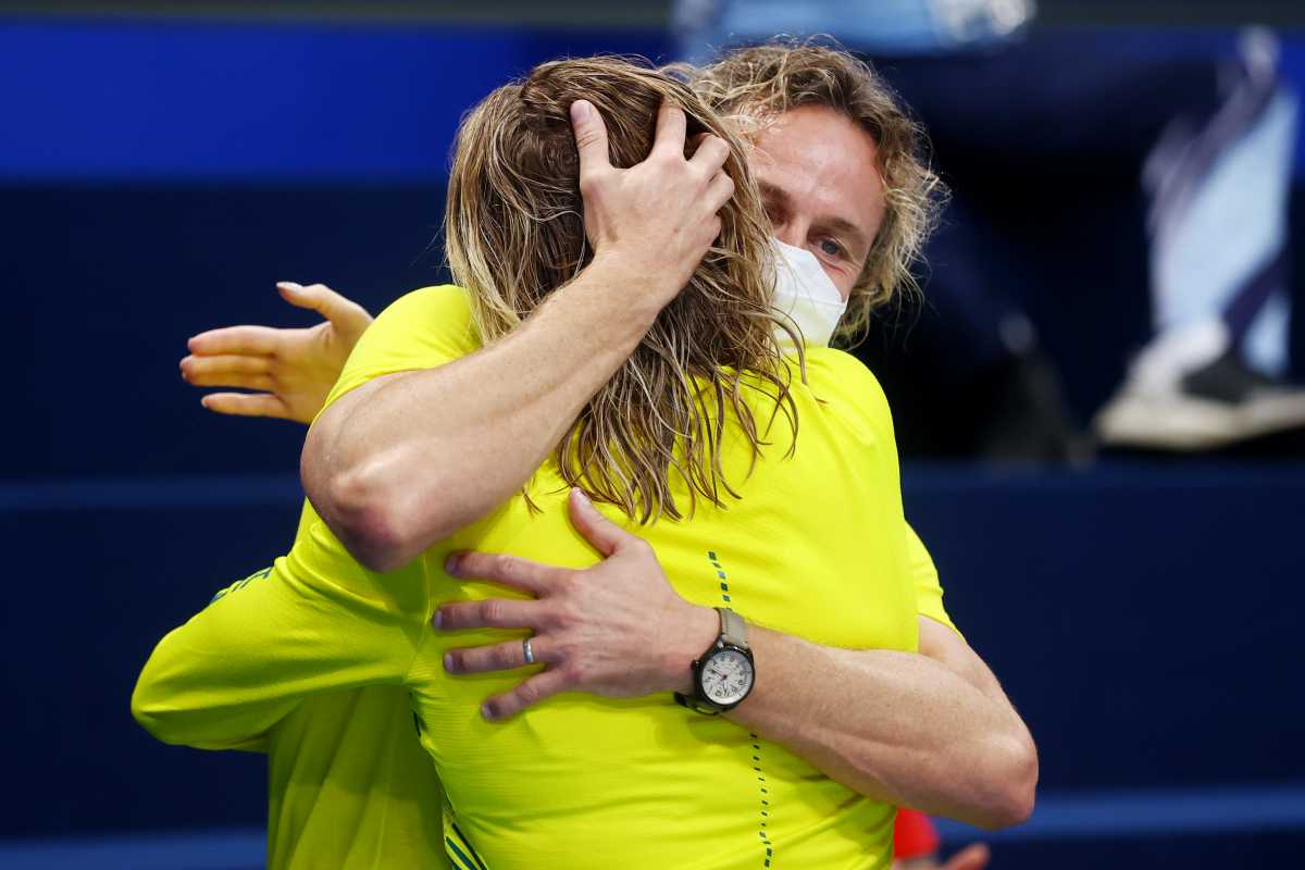 Tokyo 2020 Olympics - Swimming - Women's 200m Freestyle - Medal Ceremony - Tokyo Aquatics Centre - Tokyo, Japan - July 28, 2021. Ariarne Titmus of Australia after winning gold with Australia swimming coach Dean Boxall REUTERS
