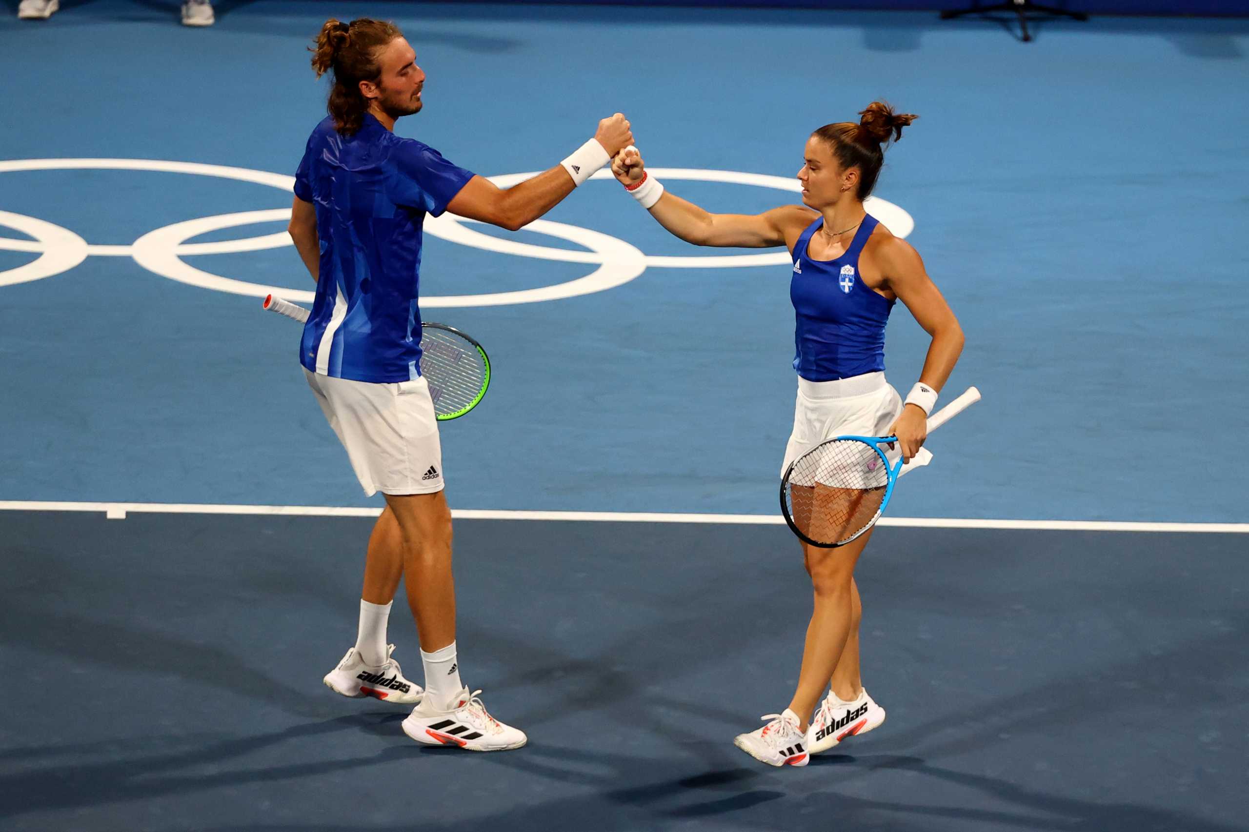 Tokyo 2020 Olympics -  Tennis - Mixed Doubles - Quarterfinal - Ariake Tennis Park  - Tokyo, Japan - July 29, 2021 Maria Sakkari of Greece and Stefanos Tsitsipas of Greece react during their quarterfinal match against Ashleigh Barty of Australia and John Peers of Australia REUTERS