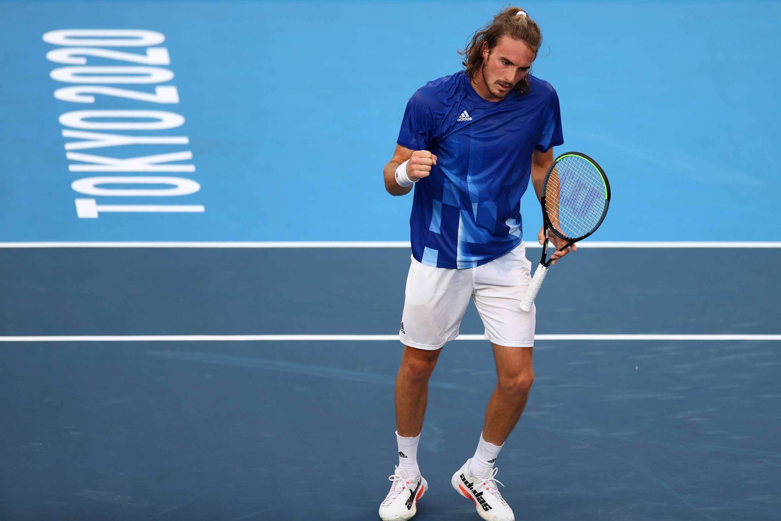 Tokyo 2020 Olympics - Tennis - Men's Singles - Round 1 - Ariake Tennis Park - Tokyo, Japan - July 25, 2021. Stefanos Tsitsipas of Greece reacts during his first round match against Philipp Kohlschreiber of Germany REUTERS
