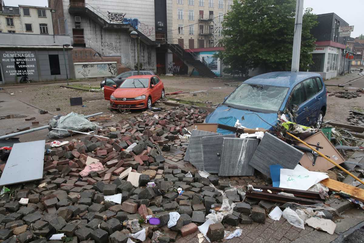 Vehicles and wreckage are seen on the street, following heavy rainfalls in Verviers, Belgium, July 16, 2021. REUTERS