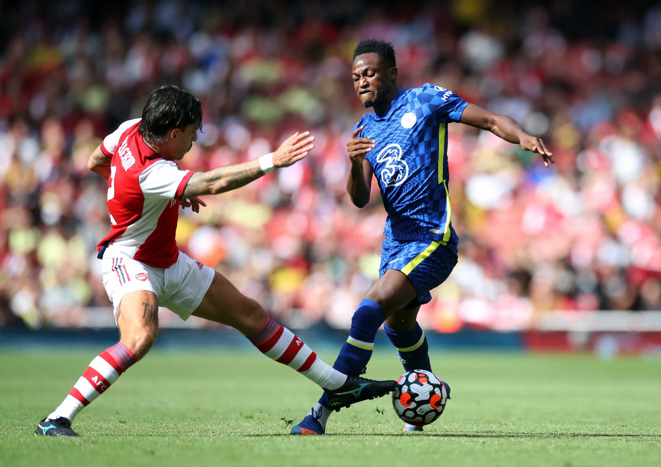 Soccer Football - Pre Season Friendly - Arsenal v Chelsea - Emirates Stadium, London, Britain - August 1, 2021 Arsenal's Hector Bellerin in action with Chelsea's Baba Rahman Action Images via Reuters
