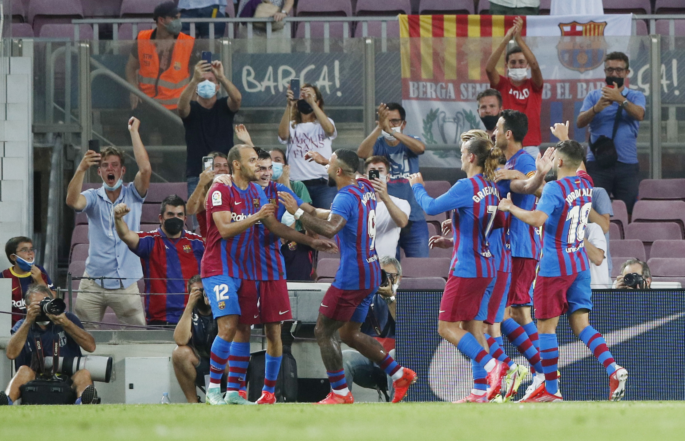 Soccer Football - LaLiga - FC Barcelona v Real Sociedad - Camp Nou, Barcelona, Spain - August 15, 2021 Barcelona's Martin Braithwaite celebrates scoring their second goal with teammates REUTERS