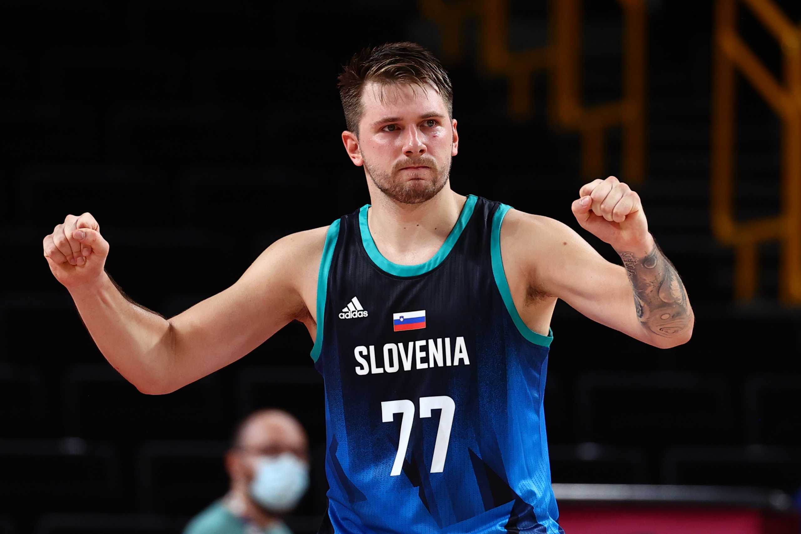 Tokyo 2020 Olympics - Basketball - Men - Group C - Spain v Slovenia - Saitama Super Arena, Saitama, Japan - August 1, 2021. Luka Doncic of Slovenia celebrates after the match REUTERS