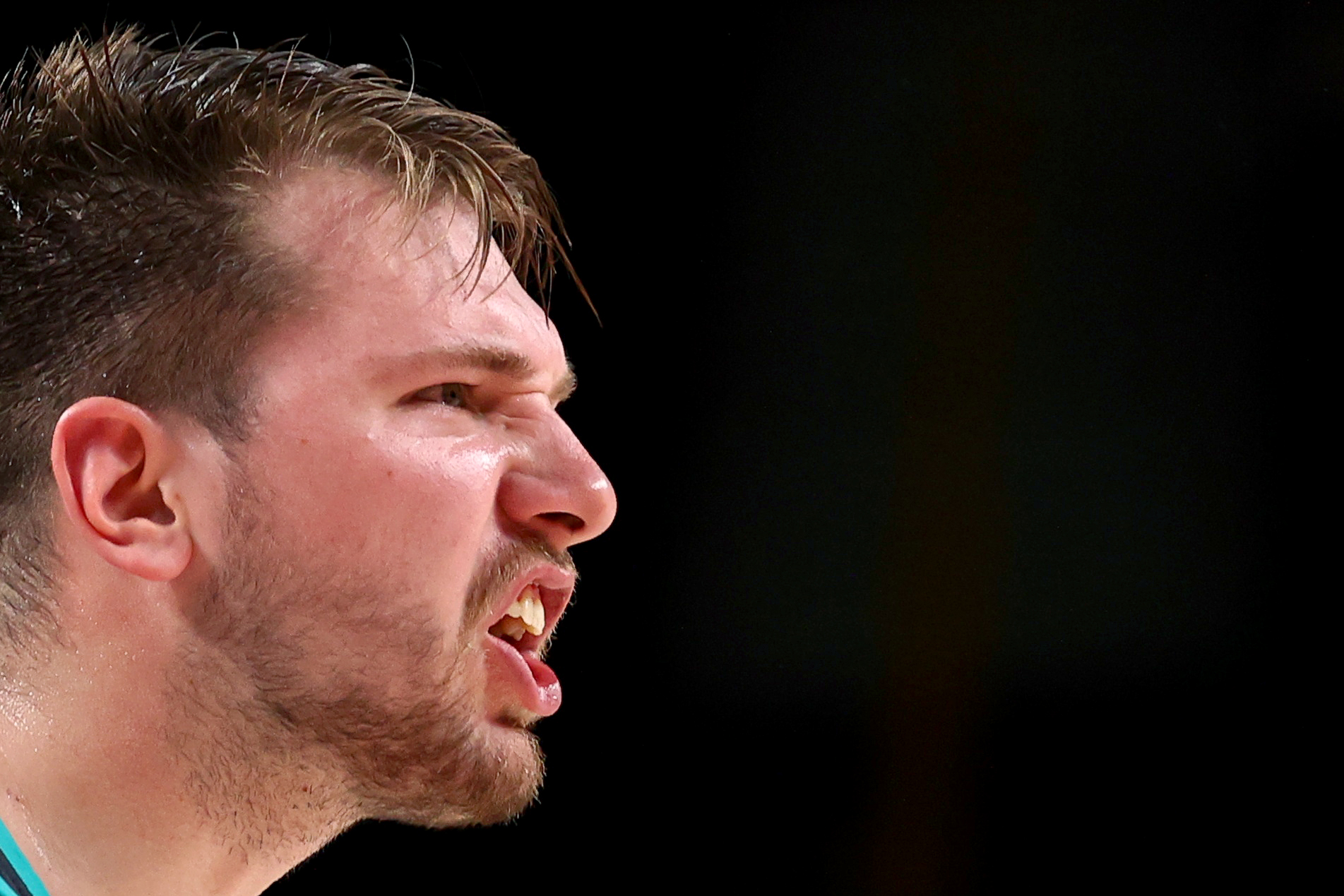 Tokyo 2020 Olympics - Basketball - Men - Semifinal - France v Slovenia - Saitama Super Arena, Saitama, Japan - August 5, 2021. Luka Doncic of Slovenia reacts REUTERS