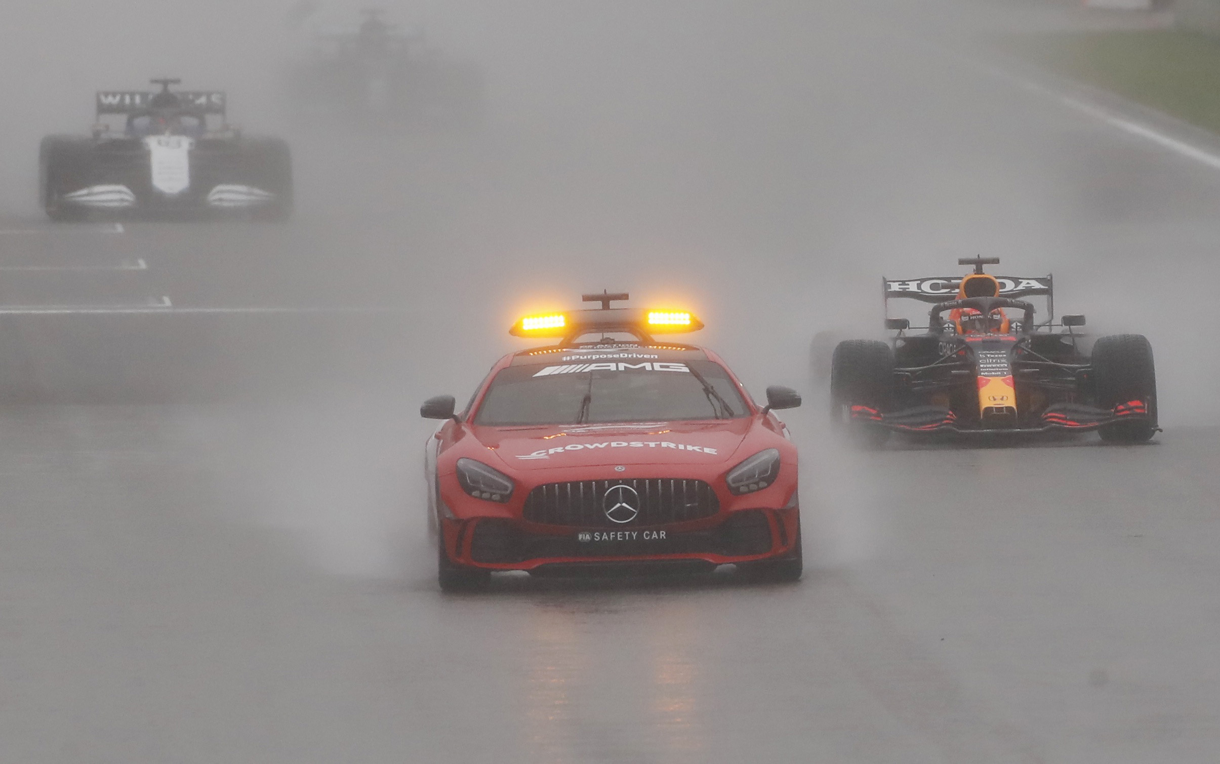 Formula One F1 - Belgian Grand Prix - Spa-Francorchamps, Spa, Belgium - August 29, 2021 General view of the safety car followed by Red Bull's Max Verstappen REUTERS