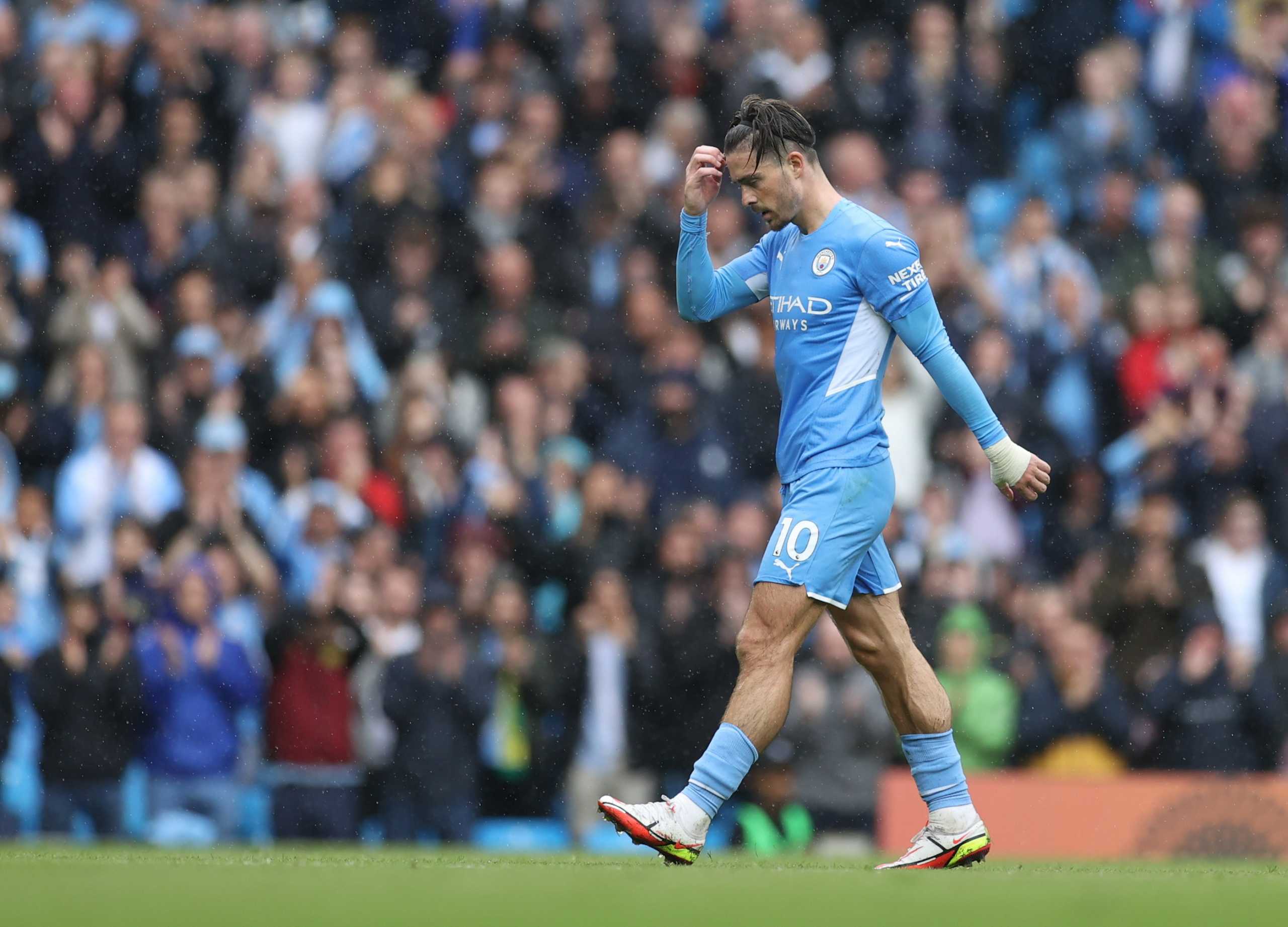Soccer Football - Premier League - Manchester City v Norwich City - Etihad Stadium, Manchester, Britain - August 21, 2021 Manchester City's Jack Grealish walking off the pitch to be substituted Action Images via Reuters