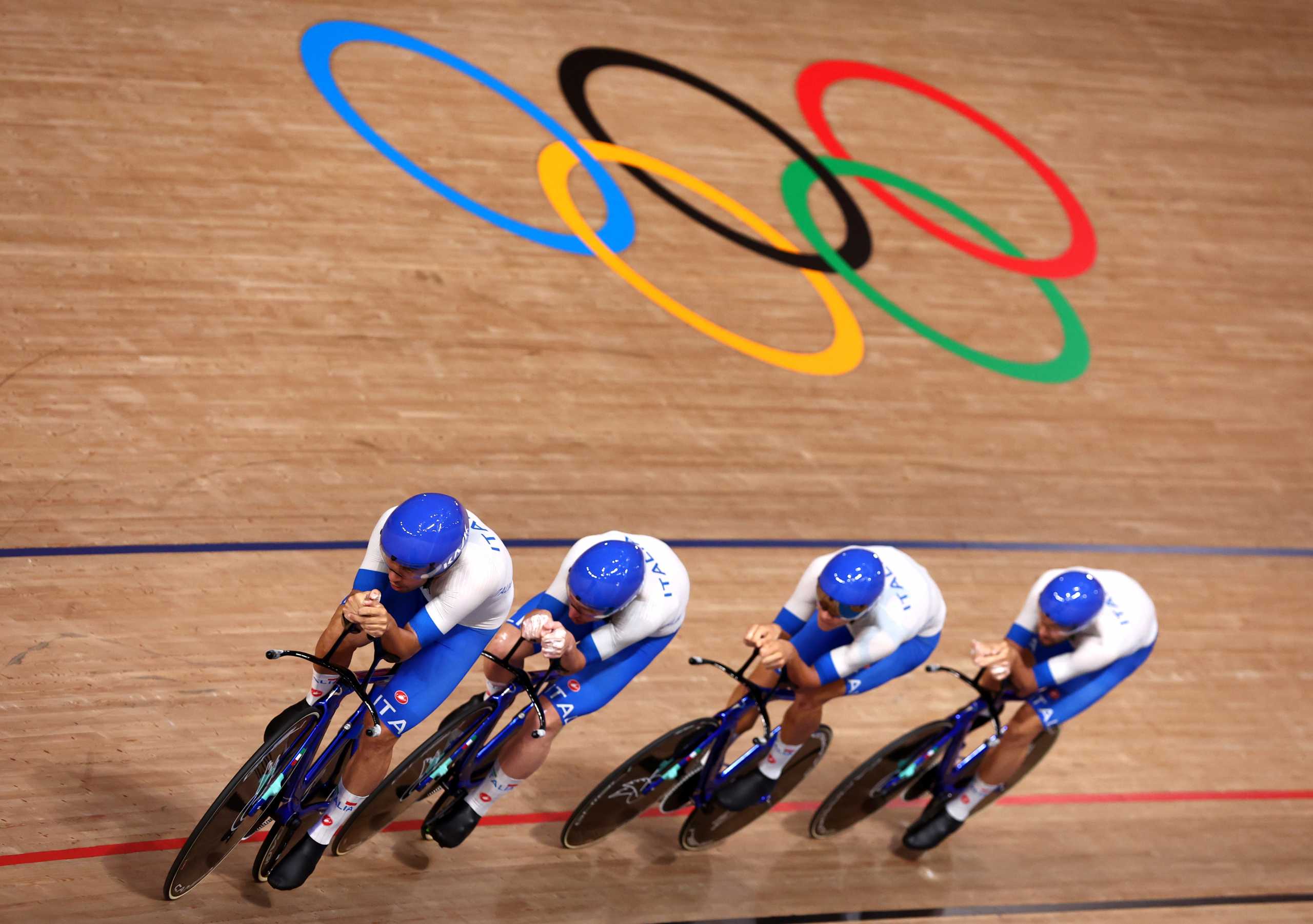 Tokyo 2020 Olympics - Cycling - Track - Men's Team Pursuit - Gold Final - Izu Velodrome, Shizuoka, Japan - August 4, 2021. Cyclists from Team Italy in action. REUTERS