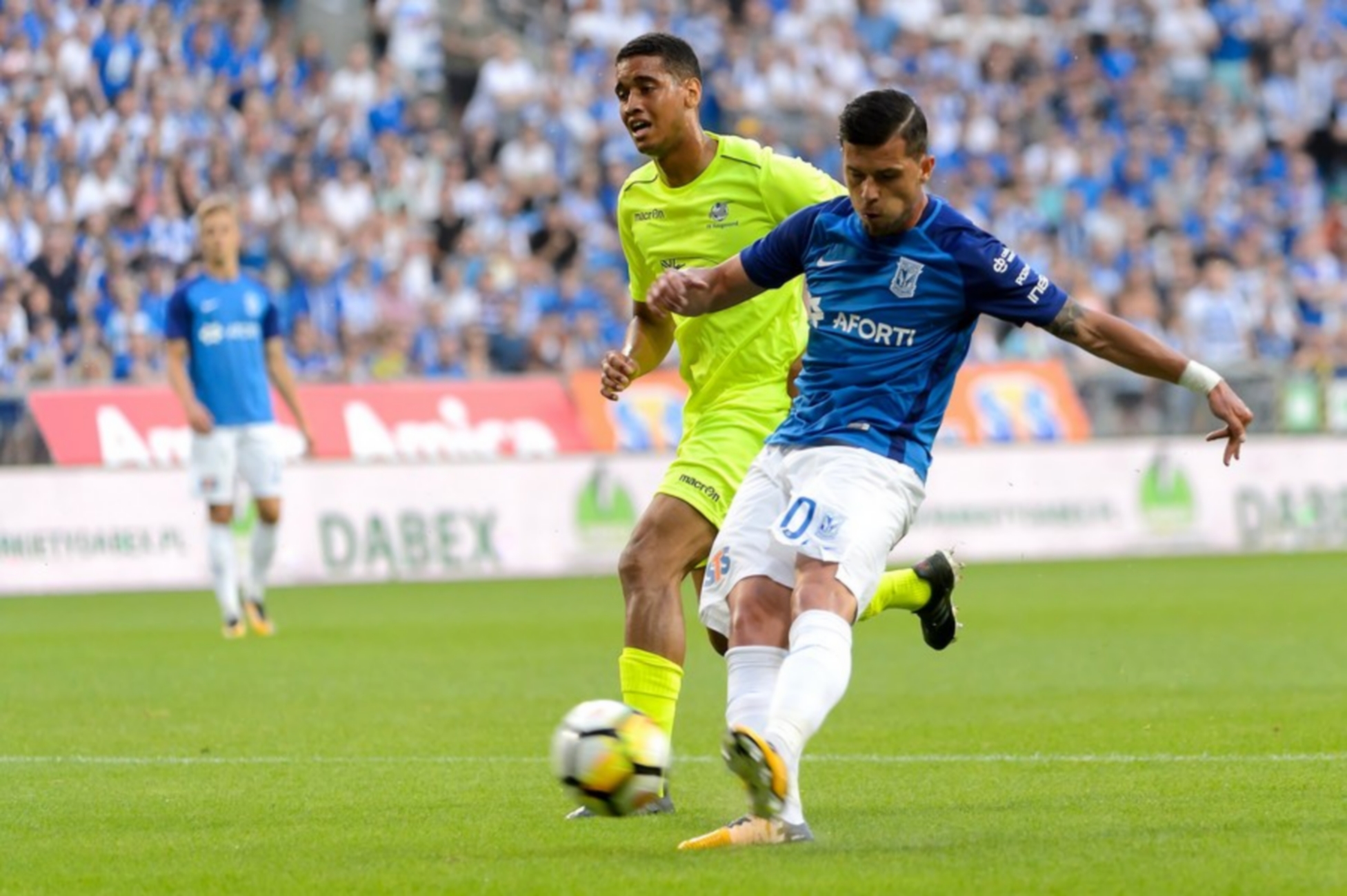 epa06099704 Darko Jevtic (R) of Lech Poznan and Bruno Leite (L) of FV Haugesund in action during the UEFA Europa League second qualifying round, second leg match between Lech Poznan and FV Haugesund in Poznan, 20 July 2017.  EPA