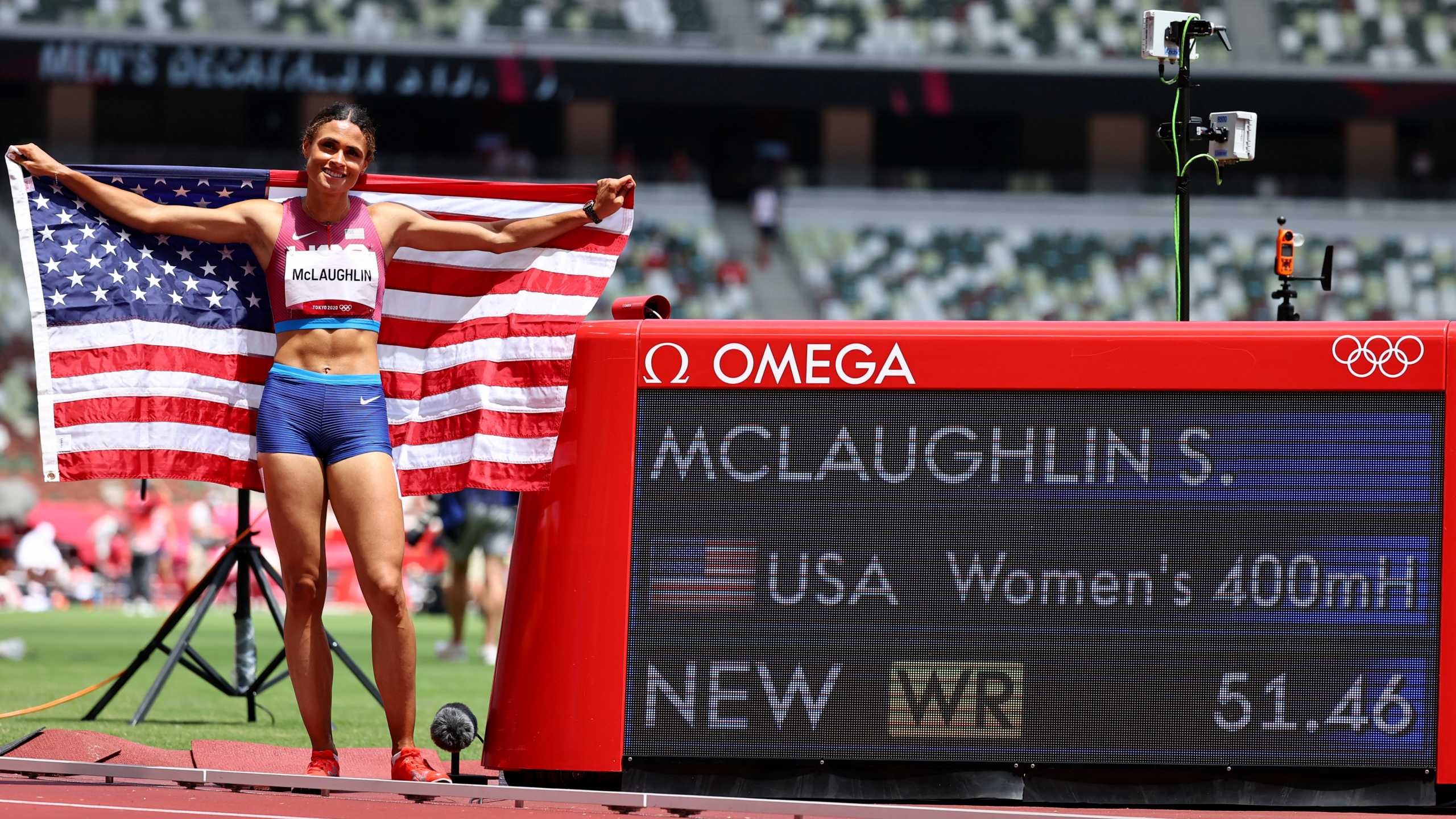 Tokyo 2020 Olympics - Athletics - Women's 400m Hurdles - Final - Olympic Stadium, Tokyo, Japan - August 4, 2021. Gold medallist Sydney McLaughlin of the United States celebrates after setting a new world record REUTERS