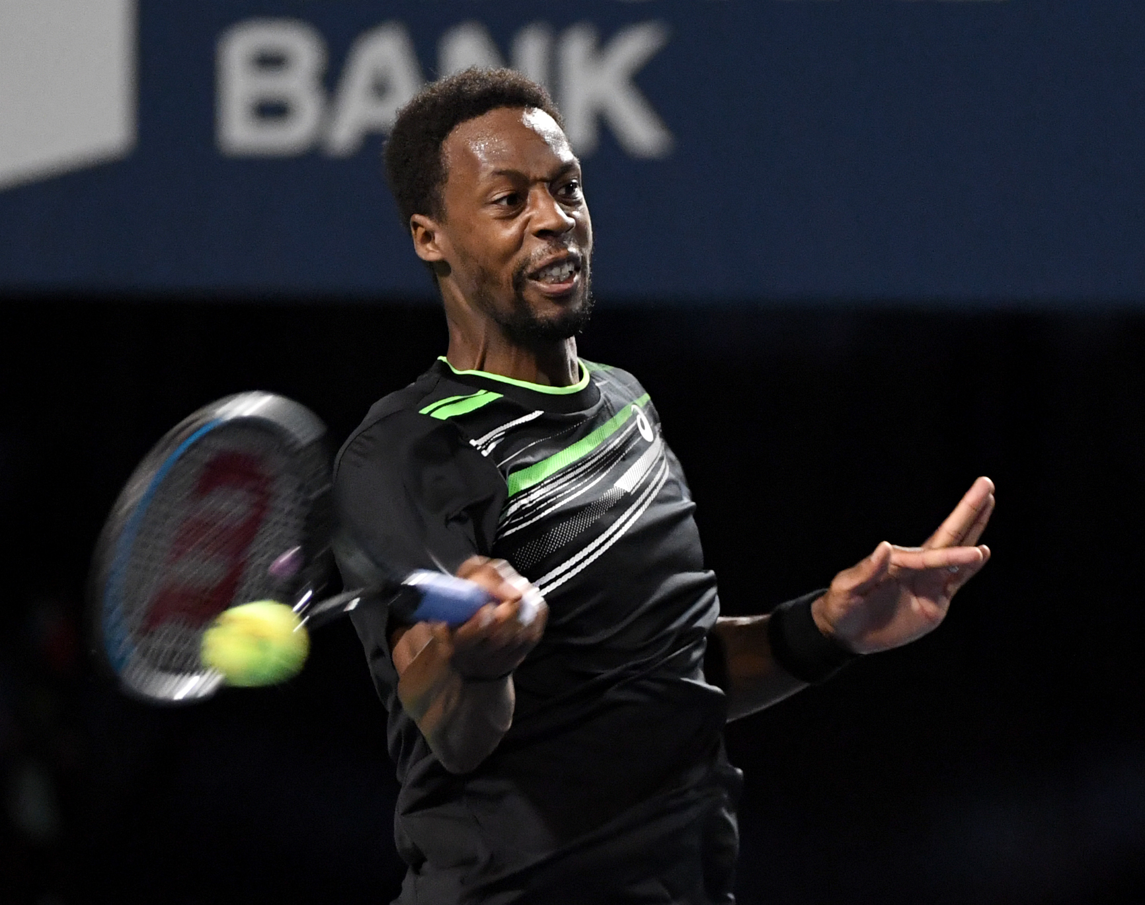Aug 13, 2021; Toronto, Ontario, Canada;  Gael Monfils of France plays a shot against John Isner of the United States during the quarter finals of the National Bank Open at Aviva Centre. Mandatory Credit: Dan Hamilton-USA TODAY Sports