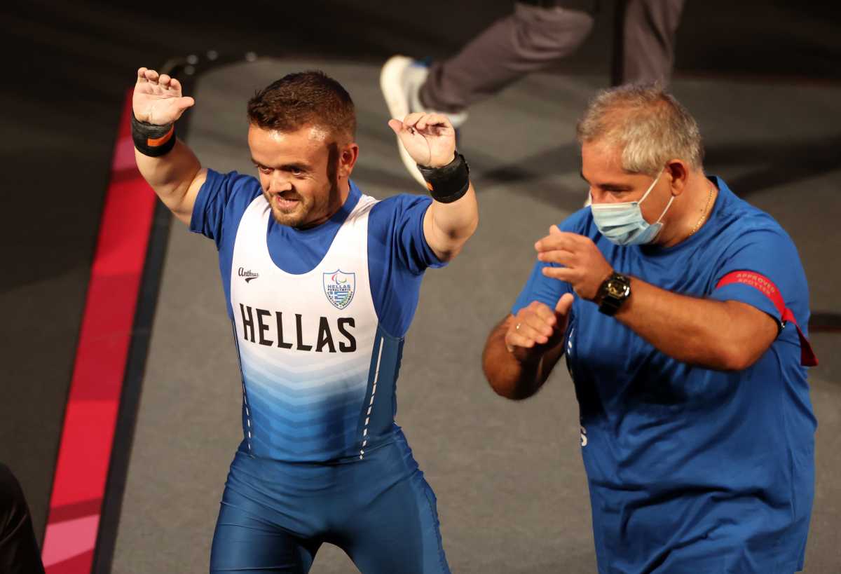 Tokyo 2020 Paralympic Games - Powerlifting - Men's -54 kg Final - Tokyo International Forum, Tokyo, Japan - August 26, 2021. Dimitrios Bakochristos of Greece reacts after his lift REUTERS