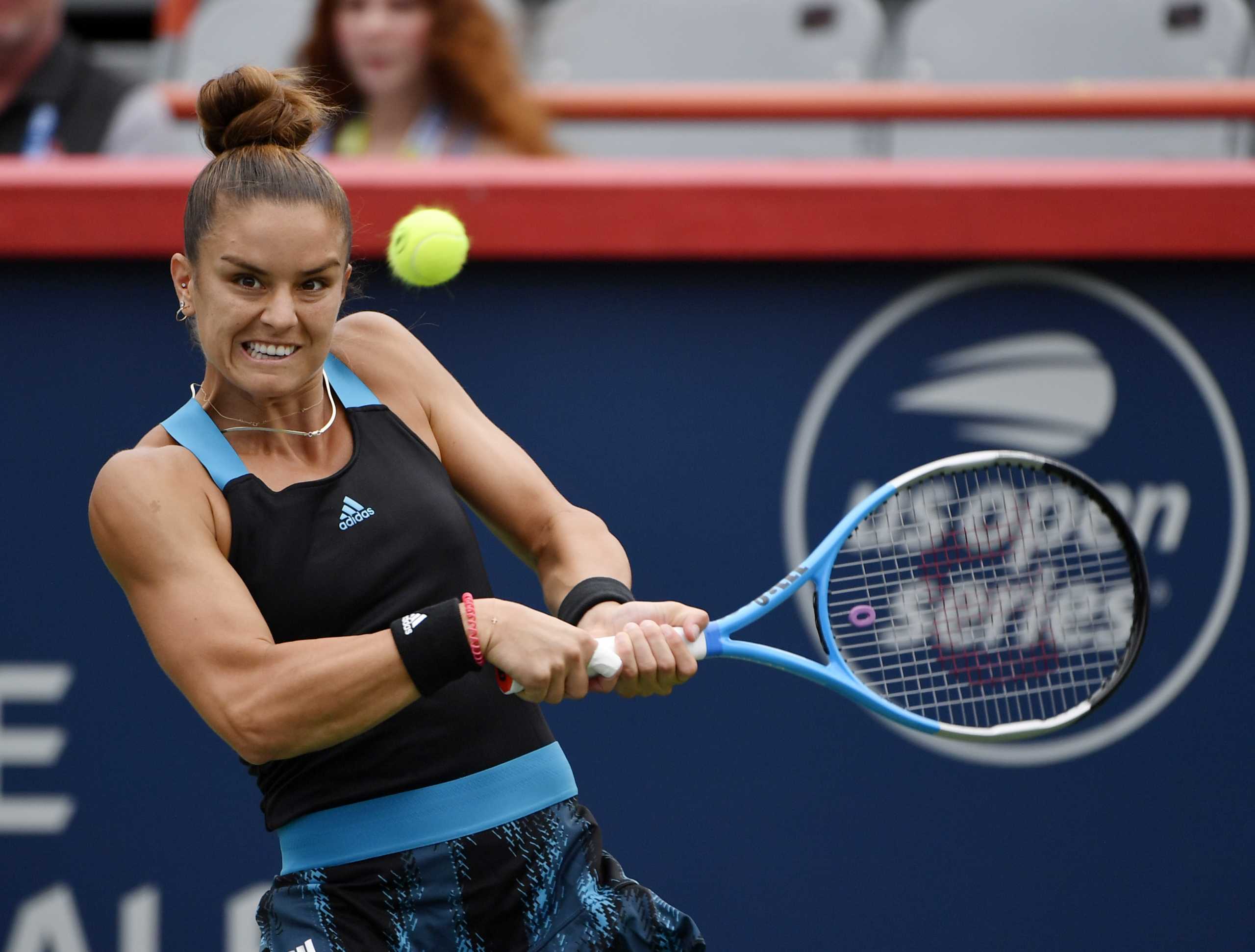 Aug 12, 2021; Montreal, Quebec, Canada; Maria Sakkari of Greece hits a shot against Victoria Azarenka of Belarus (not pictured) during third round play at Stade IGA. Mandatory Credit: Eric Bolte-USA TODAY Sports