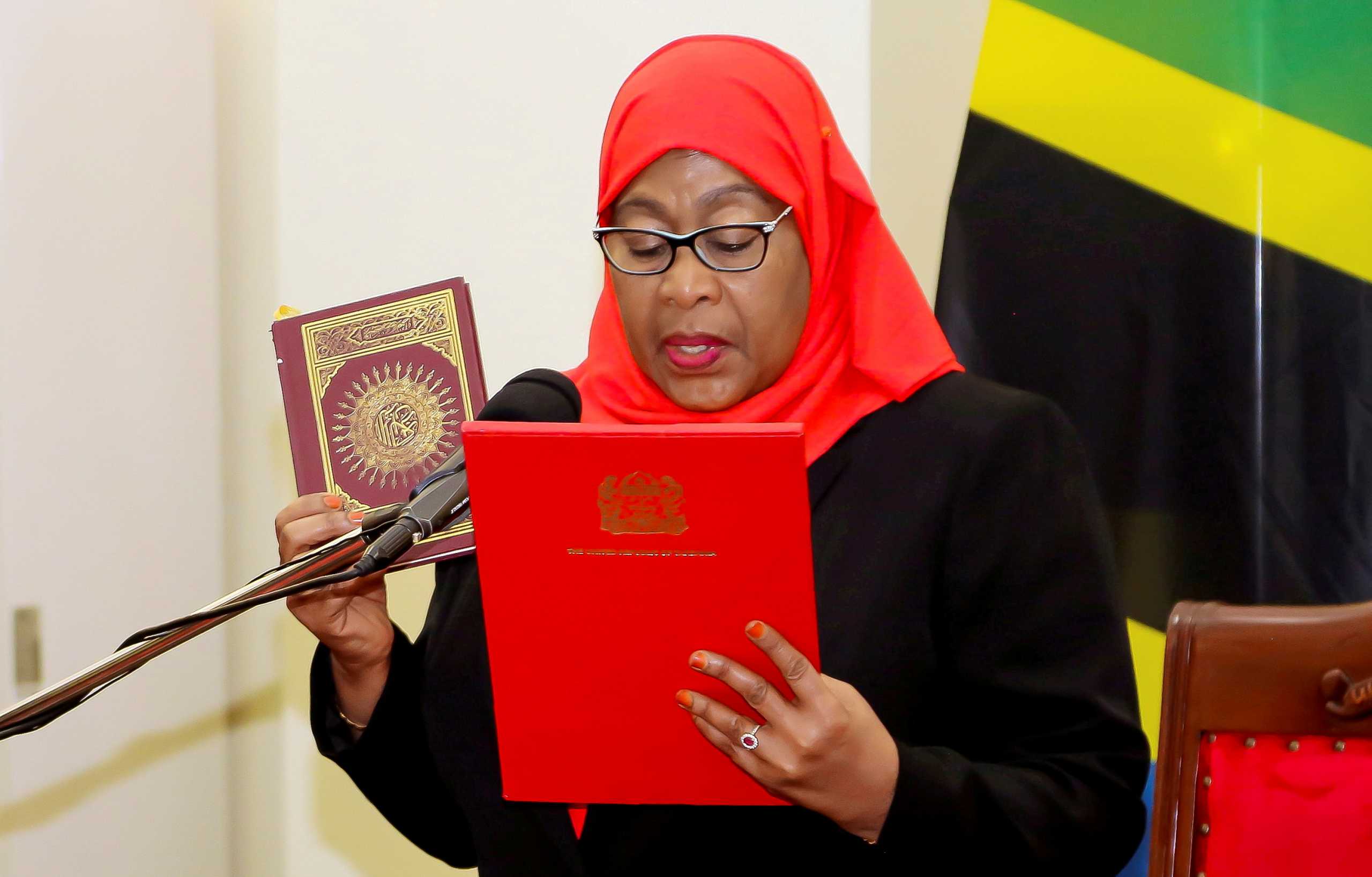 FILE PHOTO: Tanzania's new President Samia Suluhu Hassan takes oath of office following the death of her predecessor John Pombe Magufuli at State House in Dar es Salaam, Tanzania March 19, 2021. REUTERS