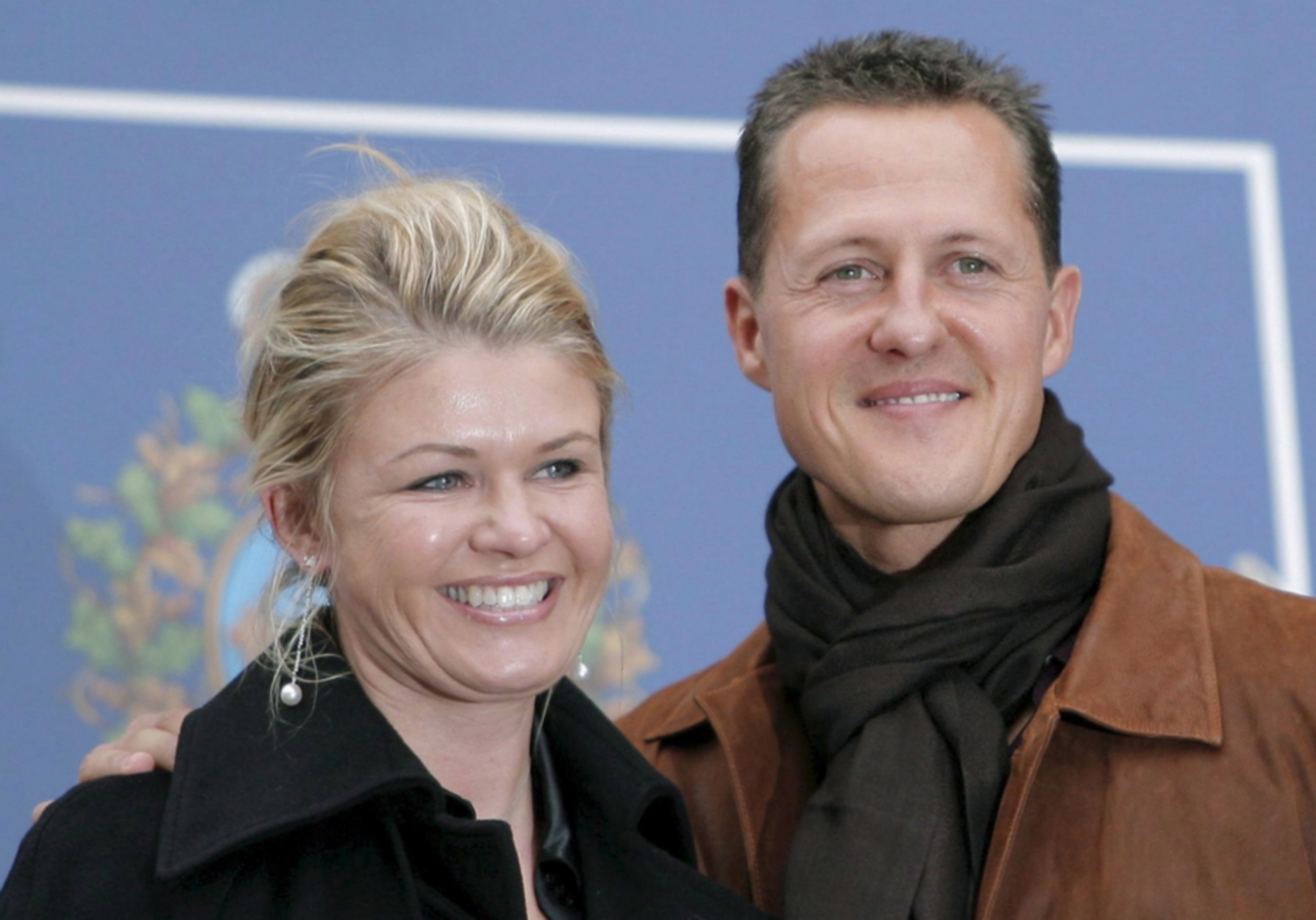 epa07258290 (FILE) Germany's seven-time Formula One World Champion Michael Schumacher (R) and his wife Corinna (L) before a meeting with Spain's Prince and Princess of Asturias at the Hotel Reconquista in Oviedo, Spain, 26 October 2007 (reissued 02 January 2019). Michael Schumacher's wife Corinna has released a rare statement ahead of the Formula One star's 50th birthday on 03 January 2018.  EPA