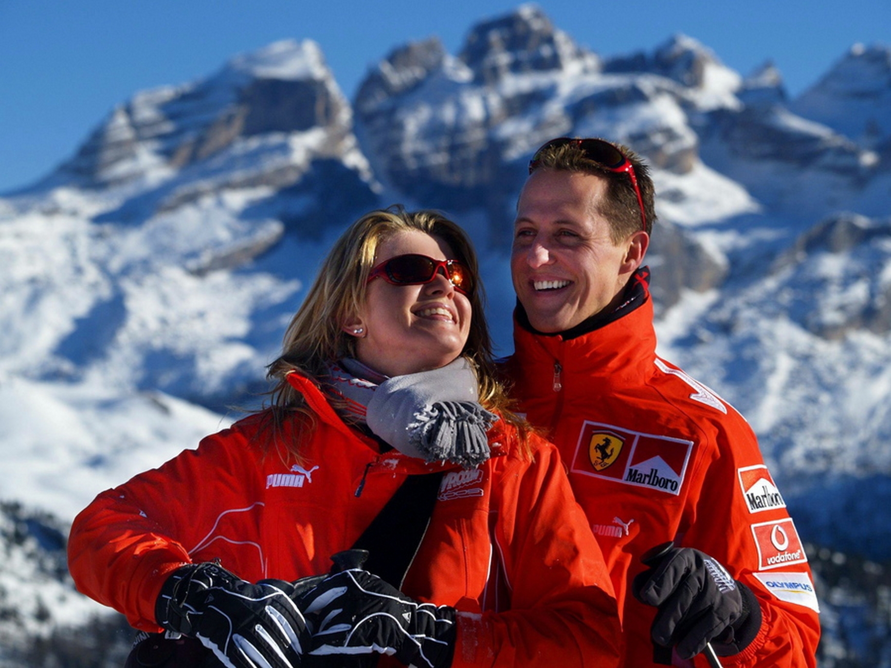 epa07258291 (FILE) German seven time Formula 1 champion Michael Schumacher (R, team Ferrari) and his wife Corinna smile in front of a mountain panorama in the ski resort of Madonna di Campiglio, Italy, 12 January 2005 (reissued 02 Janury 2019). Michael Schumacher's wife Corinna has released a rare statement ahead of the Formula One star's 50th birthday on 03 January 2018.  EPA