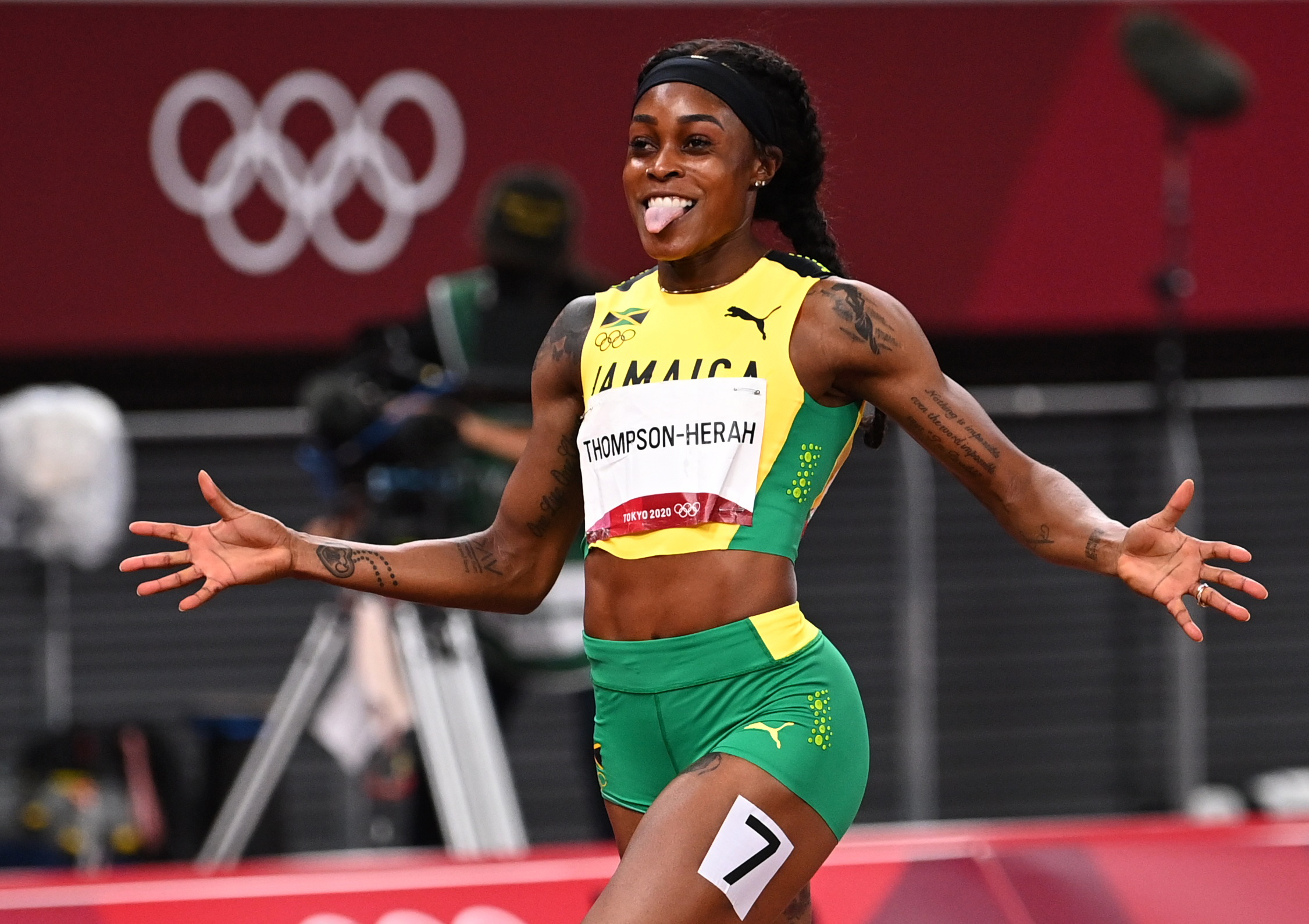 Tokyo 2020 Olympics - Athletics - Women's 200m - Final - Olympic Stadium, Tokyo, Japan - August 3, 2021. Elaine Thompson-Herah of Jamaica celebrates as she crosses the line to win gold REUTERS