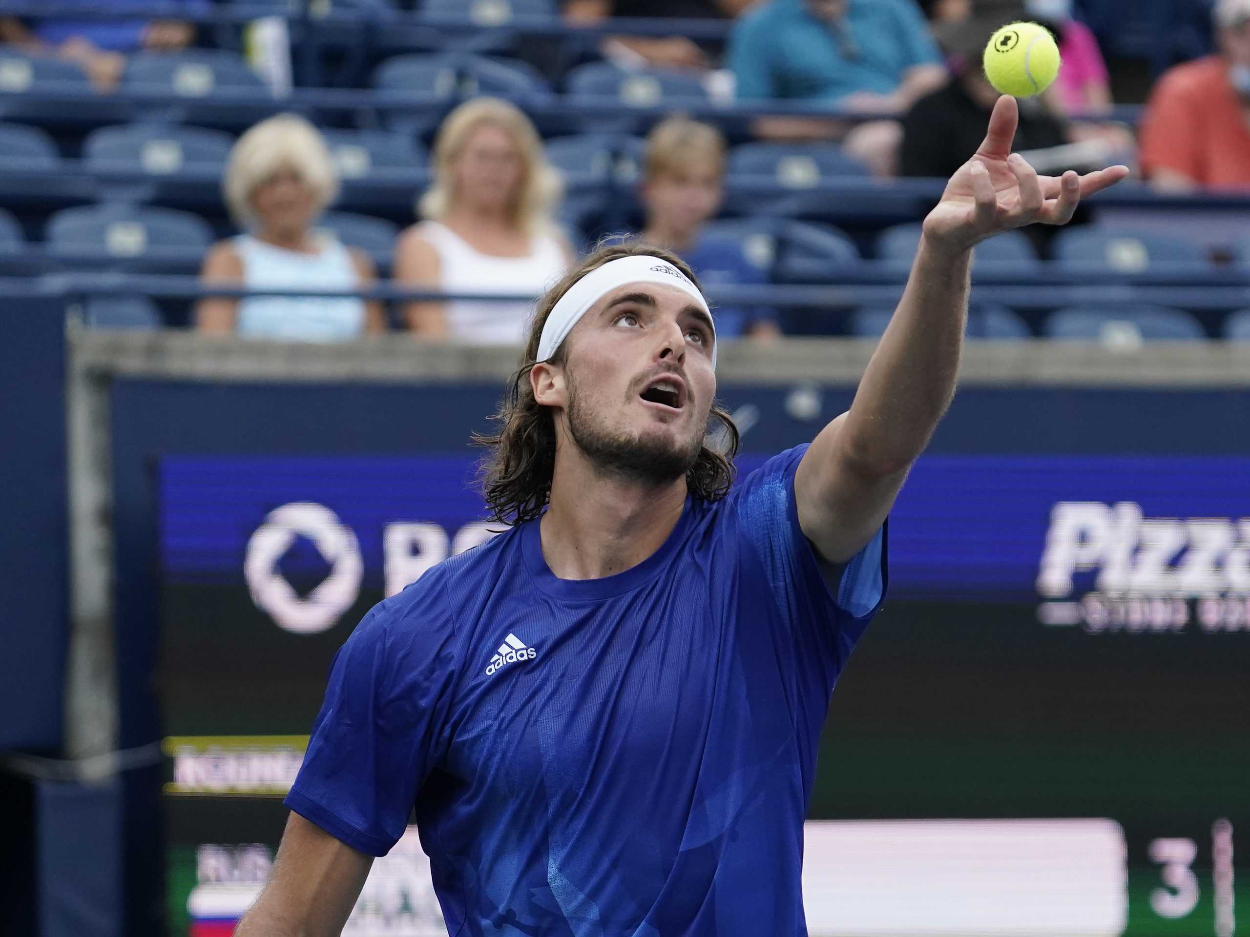 Aug 12, 2021; Toronto, Ontario, Canada; Stefanos Tsitsipas of Greece goes to serve a ball to Karen Khachanov of Russia (not pictured) at Aviva Centre. Mandatory Credit: John E. Sokolowski-USA TODAY Sports