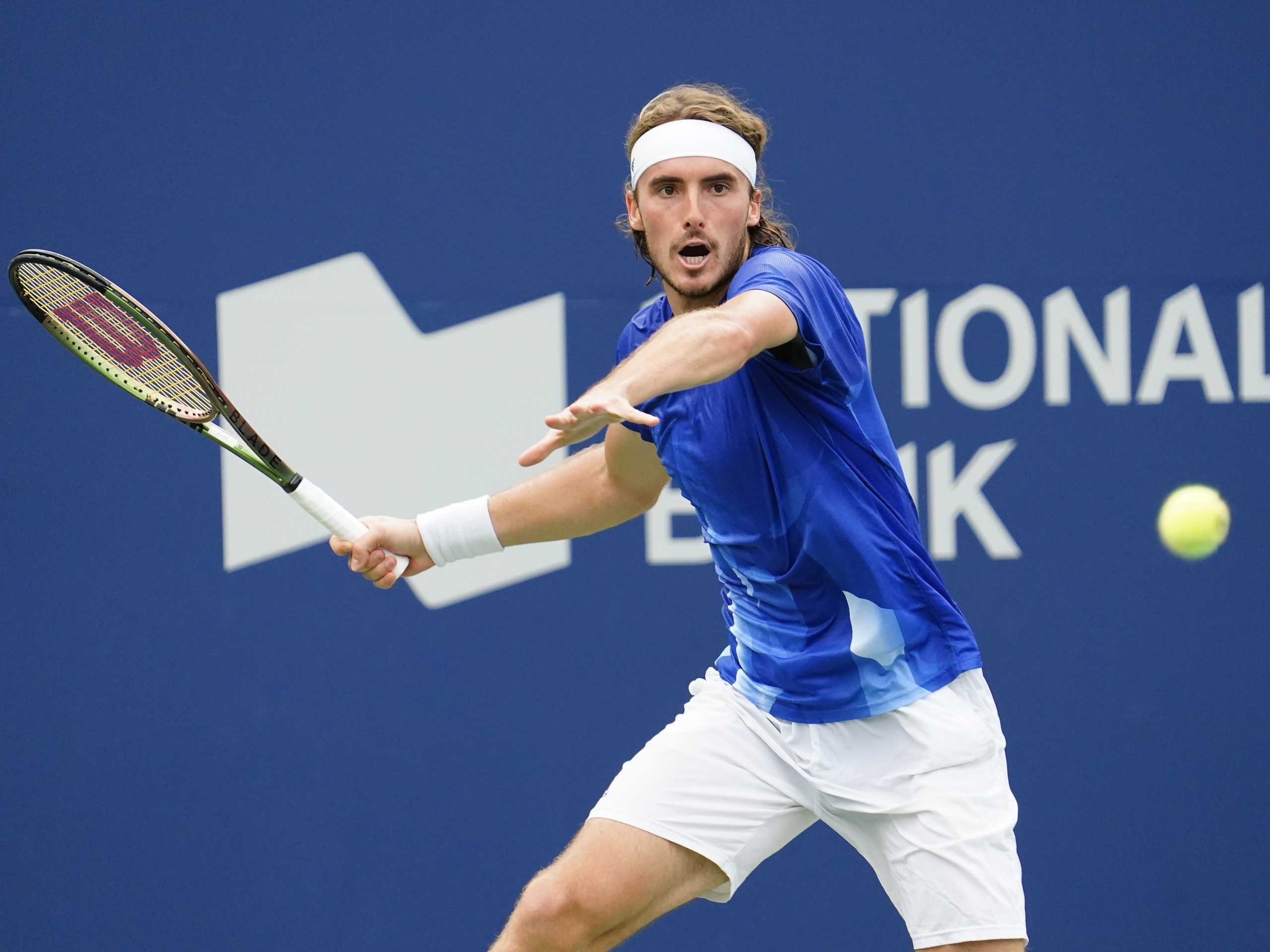 Aug 13, 2021; Toronto, Ontario, Canada; Stefanos Tsitsipas of Greece returns a ball to Casper Ruud of Norway  (not pictured) at Aviva Centre. Mandatory Credit: John E. Sokolowski-USA TODAY Sports