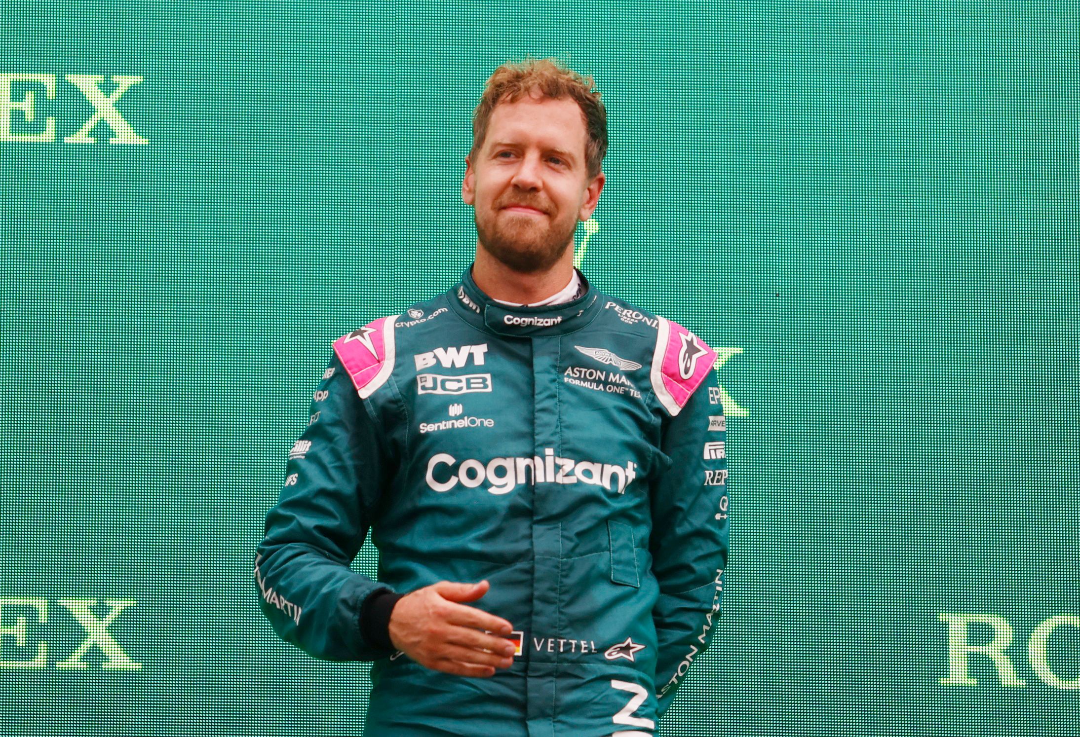 Formula One F1 - Hungarian Grand Prix - Hungaroring, Budapest, Hungary - August 1, 2021 Second placed Sebastian Vettel of Aston Martin on the podium after the race Pool via REUTERS