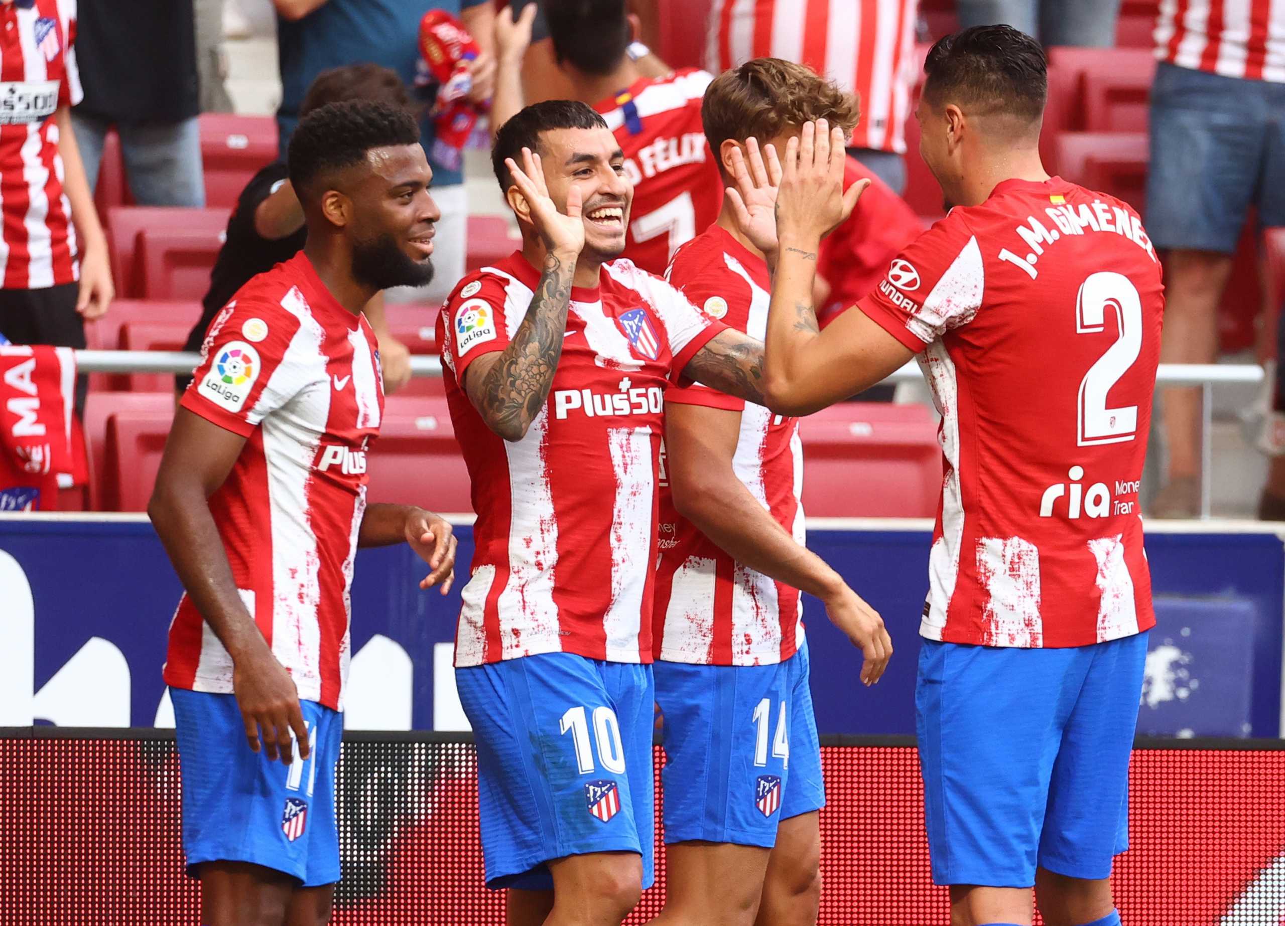 Soccer Football - LaLiga - Atletico Madrid v Elche - Wanda Metropolitano, Madrid, Spain - August 22, 2021 Atletico Madrid's Angel Correa celebrates scoring their first goal with teammates REUTERS