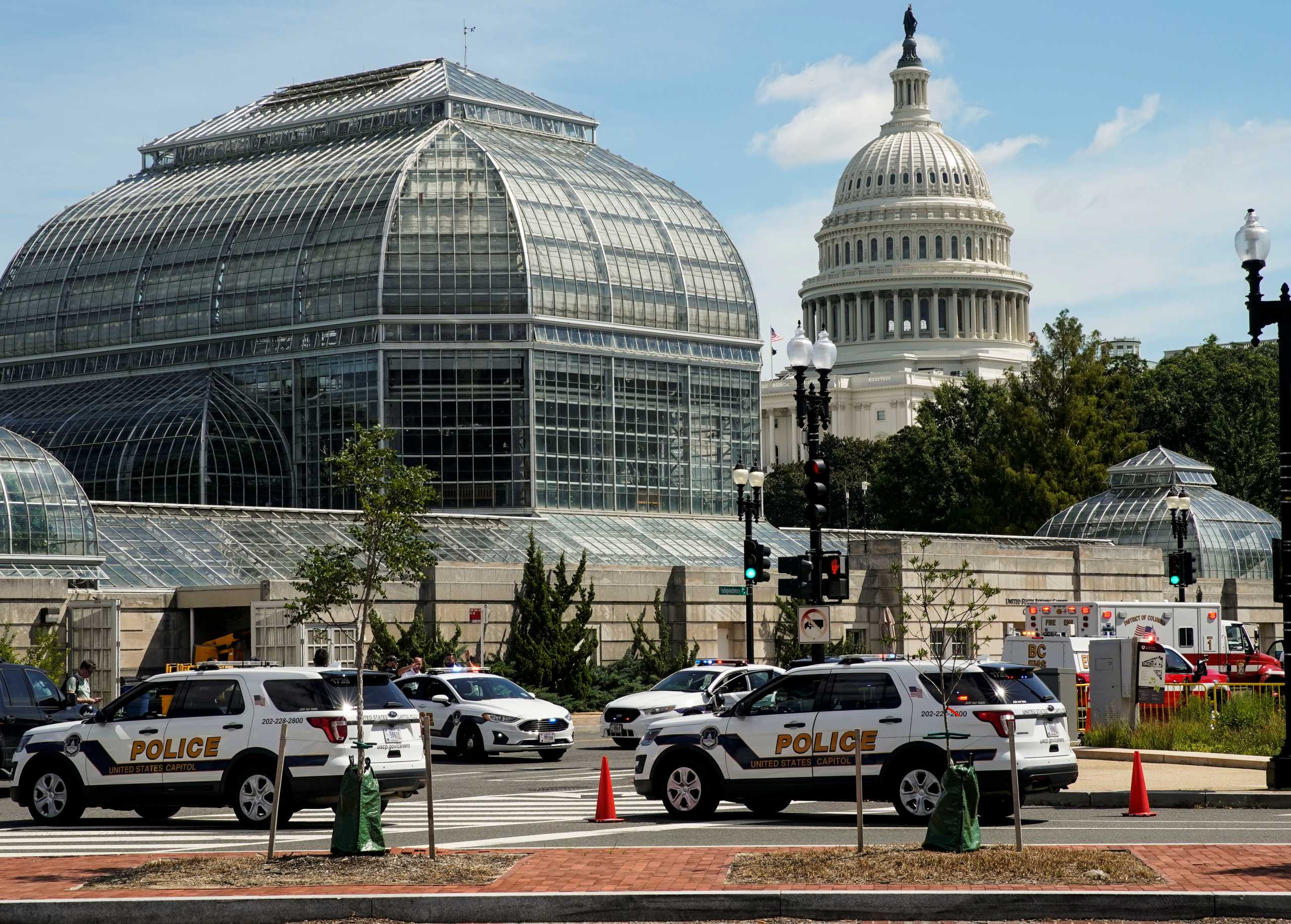 U.S. Capitol Police vehicles and other emergency vehicles respond as police investigated reports of a suspicious vehicle near the U.S. Capitol in Washington, U.S., August 19, 2021. REUTERS