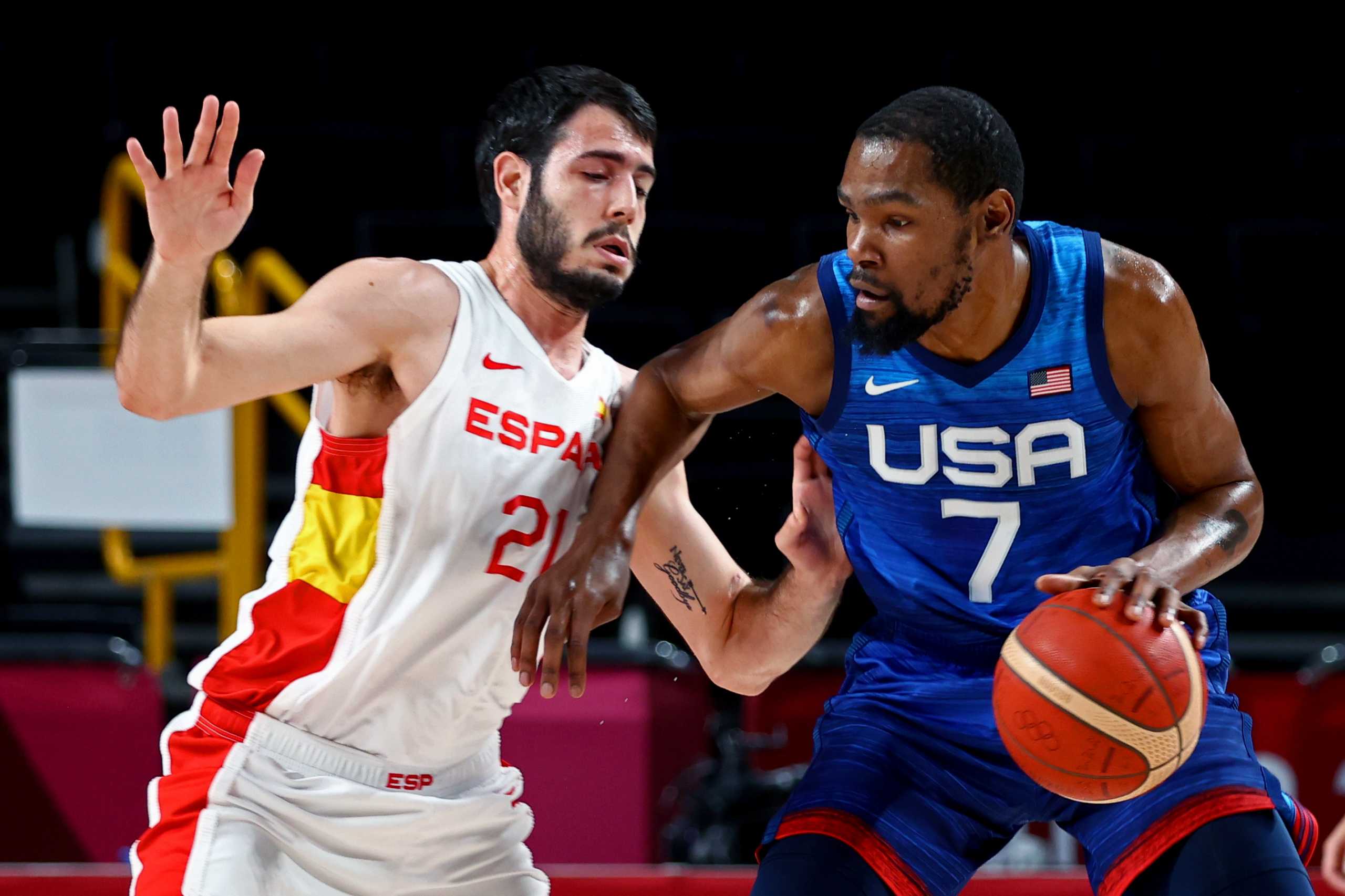 Tokyo 2020 Olympics - Basketball - Men - Quarterfinal - Spain v United States - Saitama Super Arena, Saitama, Japan - August 3, 2021. Kevin Durant of the United States in action with Alex Abrines of Spain REUTERS