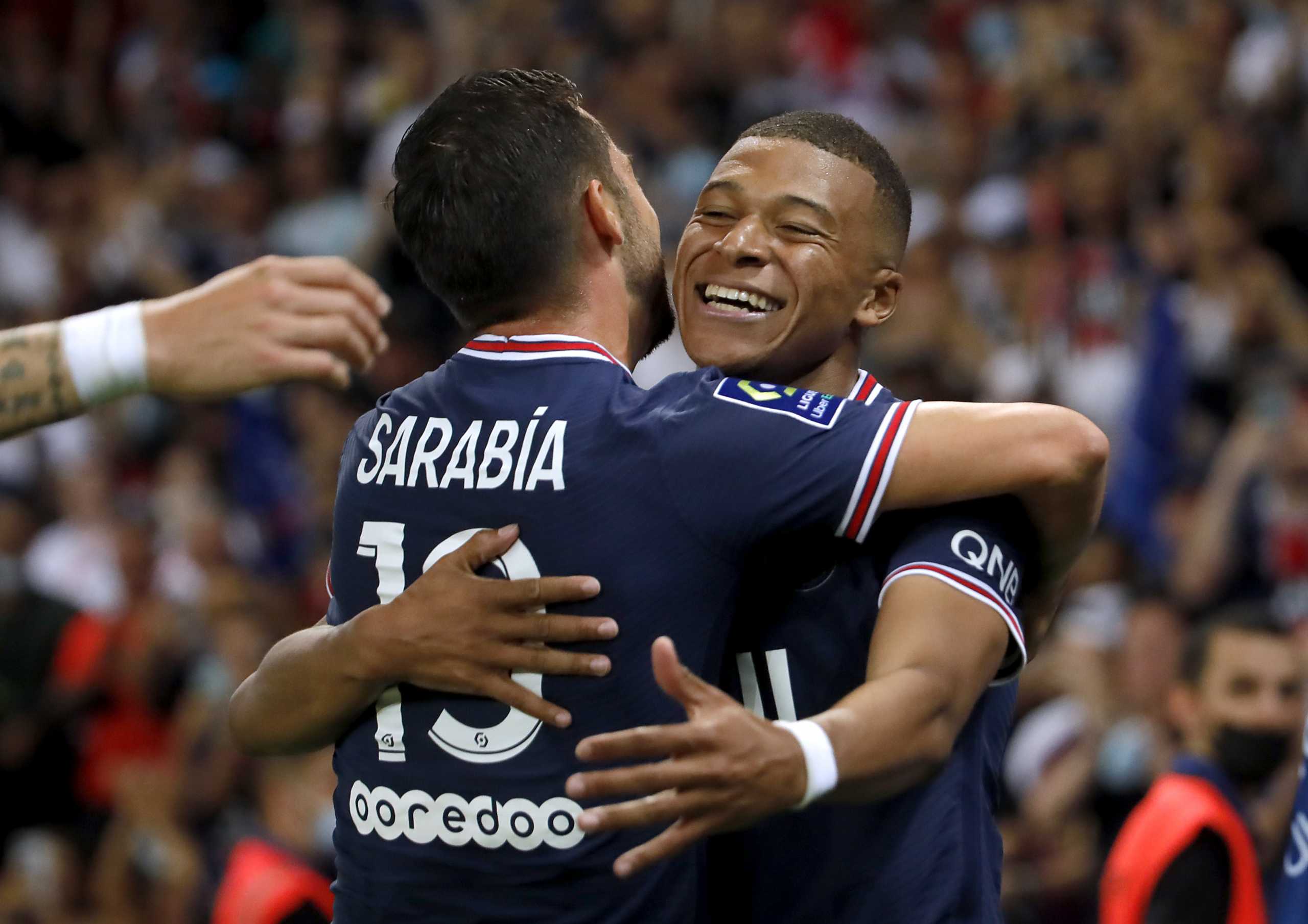 Soccer Football - Ligue 1 - Paris St Germain v RC Strasbourg - Parc des Princes, Paris, France - August 14, 2021  Paris St Germain's Pablo Sarabia celebrates scoring their fourth goal with Kylian Mbappe REUTERS