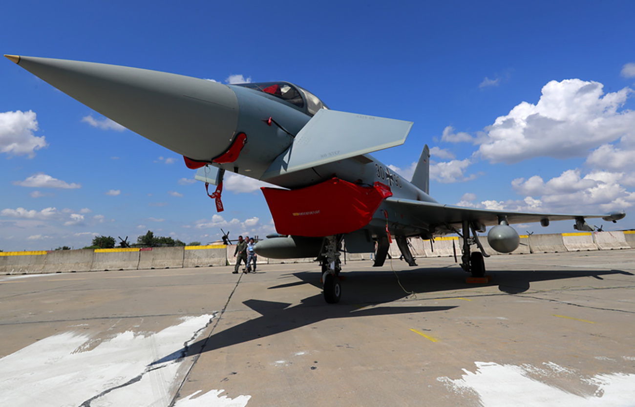 epa09318465 An Eurofighter Typhoon jet fighter of the German Air Force on the ground after a NATO Reinforce Air Police Exercise held in the air above the international waters of the Black Sea, near the Mihail Kogalniceanu 57 Air Base, Romania, 02 July 2021. The ADEX 2021 represents a joint training mission of the Allied Air Force and the navy with the participation of Romanian Air Force, British Royal Air Force and German Air Force jet fighters in the national airspace and on the international waters of the Black Sea. The joint air police missions contribute to the development of reaction and deterrence capacity, as well as to the consolidation of interoperability between the Romanian, British and German Air Forces. The NATO-led reinforced air police is a peacetime collective defense mission to protect the integrity of the Alliance's airspace.  EPA