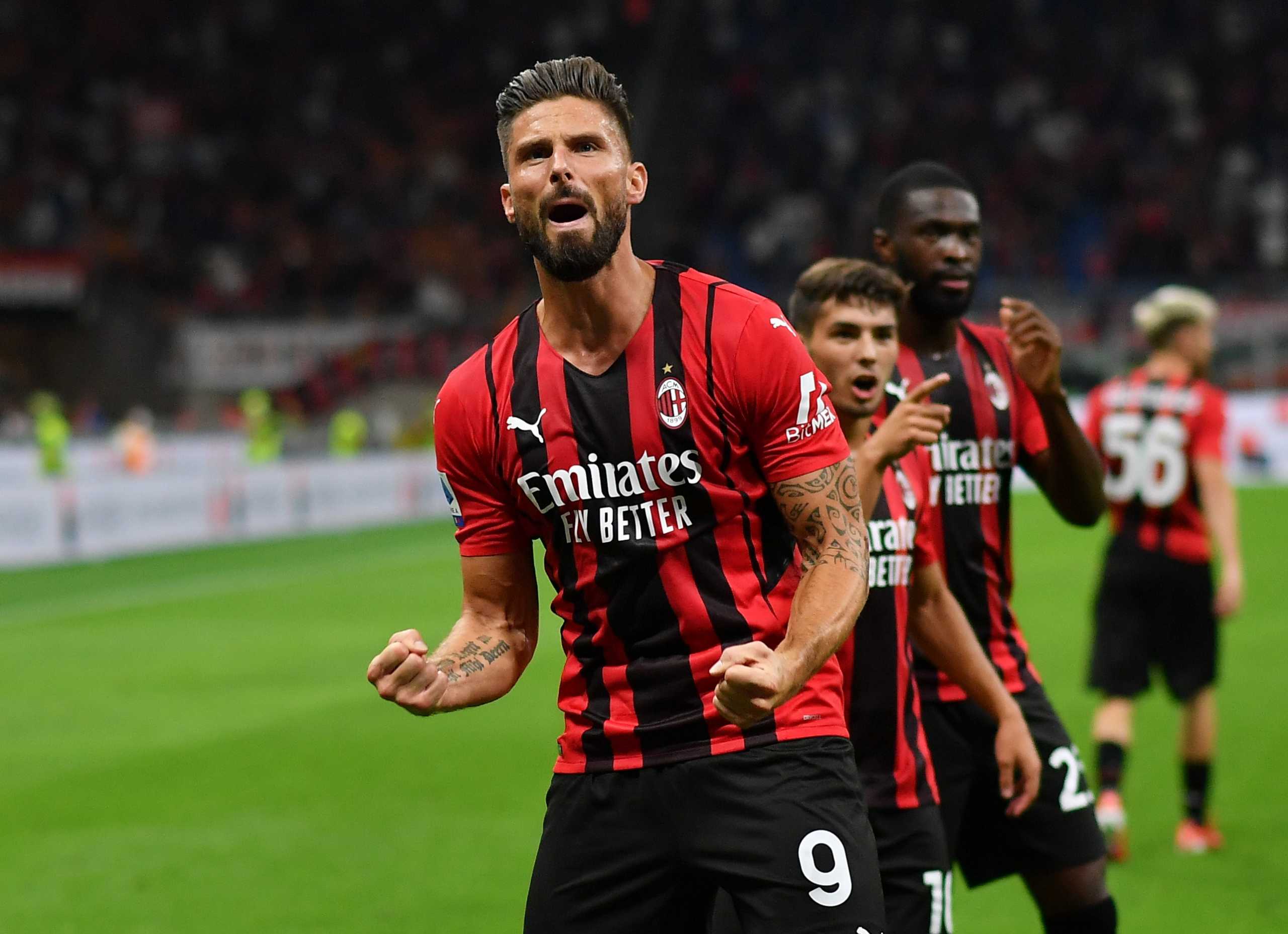 Soccer Football - Serie A - AC Milan v Cagliari - San Siro, Milan, Italy - August 29, 2021 AC Milan's Olivier Giroud celebrates scoring their third goal REUTERS
