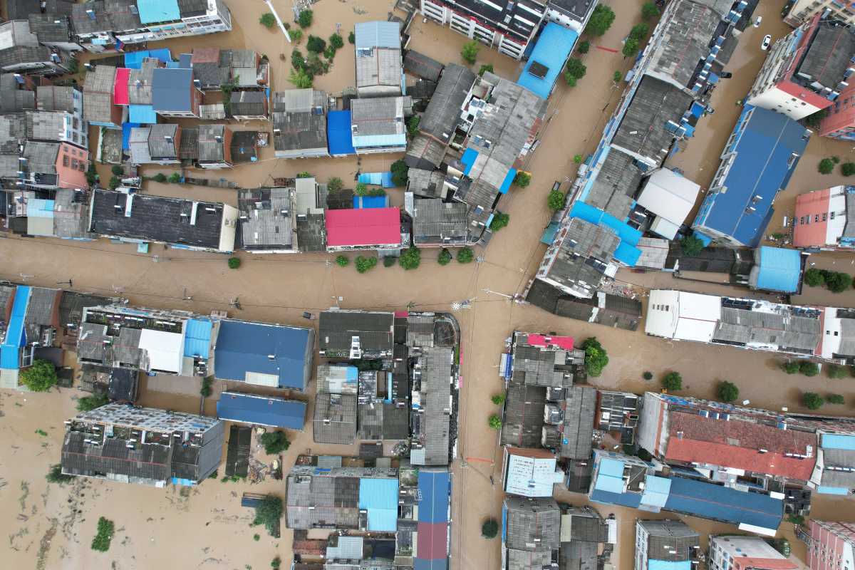 An aerial view shows the flooded town of Liulin following heavy rainfall in Suizhou, Hubei province, China August 12, 2021. Picture taken August 12, 2021 with a drone. cnsphoto via REUTERS   ATTENTION EDITORS - THIS IMAGE WAS PROVIDED BY A THIRD PARTY. CHINA OUT.
