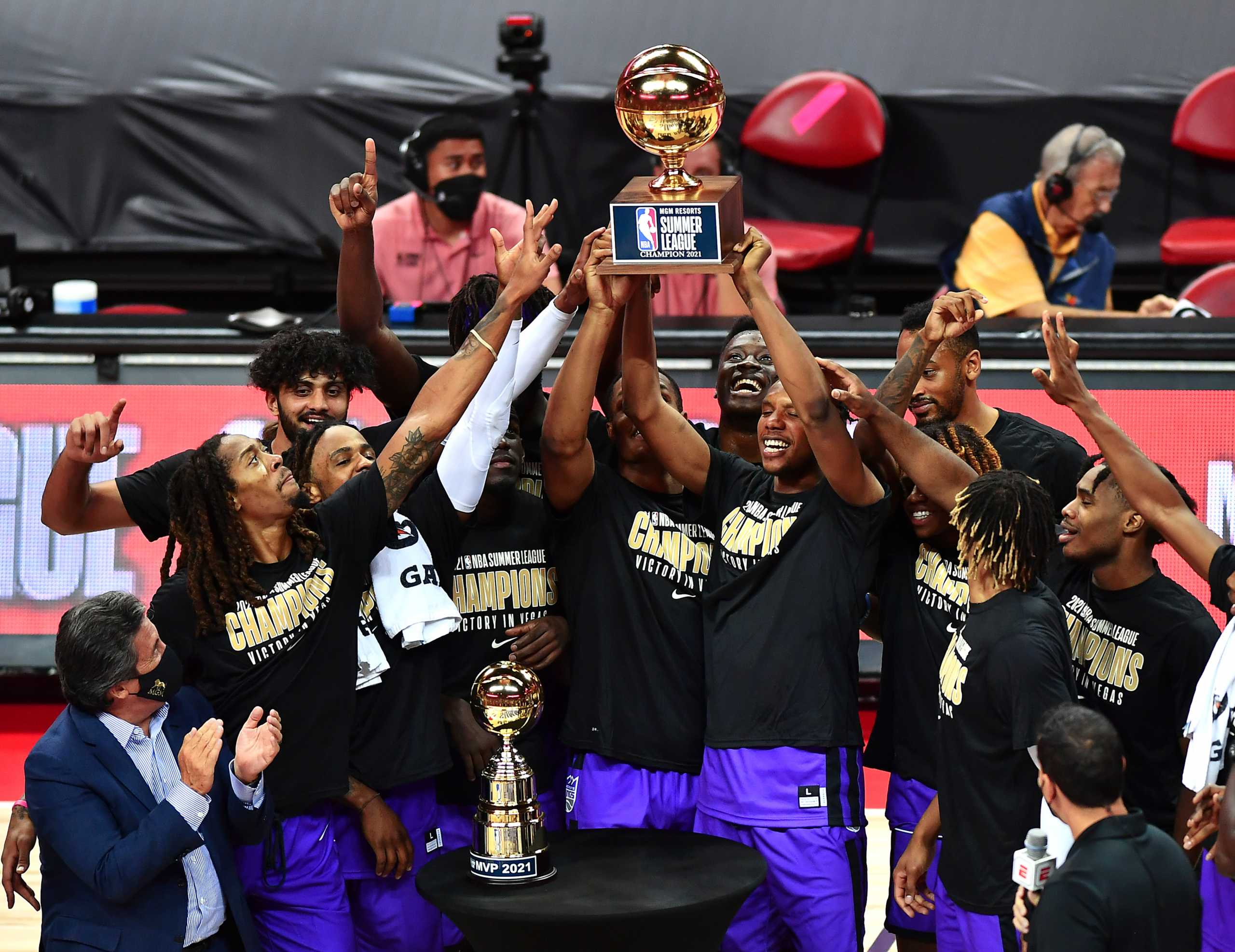 Aug 17, 2021; Las Vegas, Nevada, USA; The Sacramento Kings celebrate with the Summer League Championship trophy after defeating the Boston Celtics 100-67 in the NBA Summer League final at Thomas & Mack Center. Mandatory Credit: Stephen R. Sylvanie-USA TODAY Sports