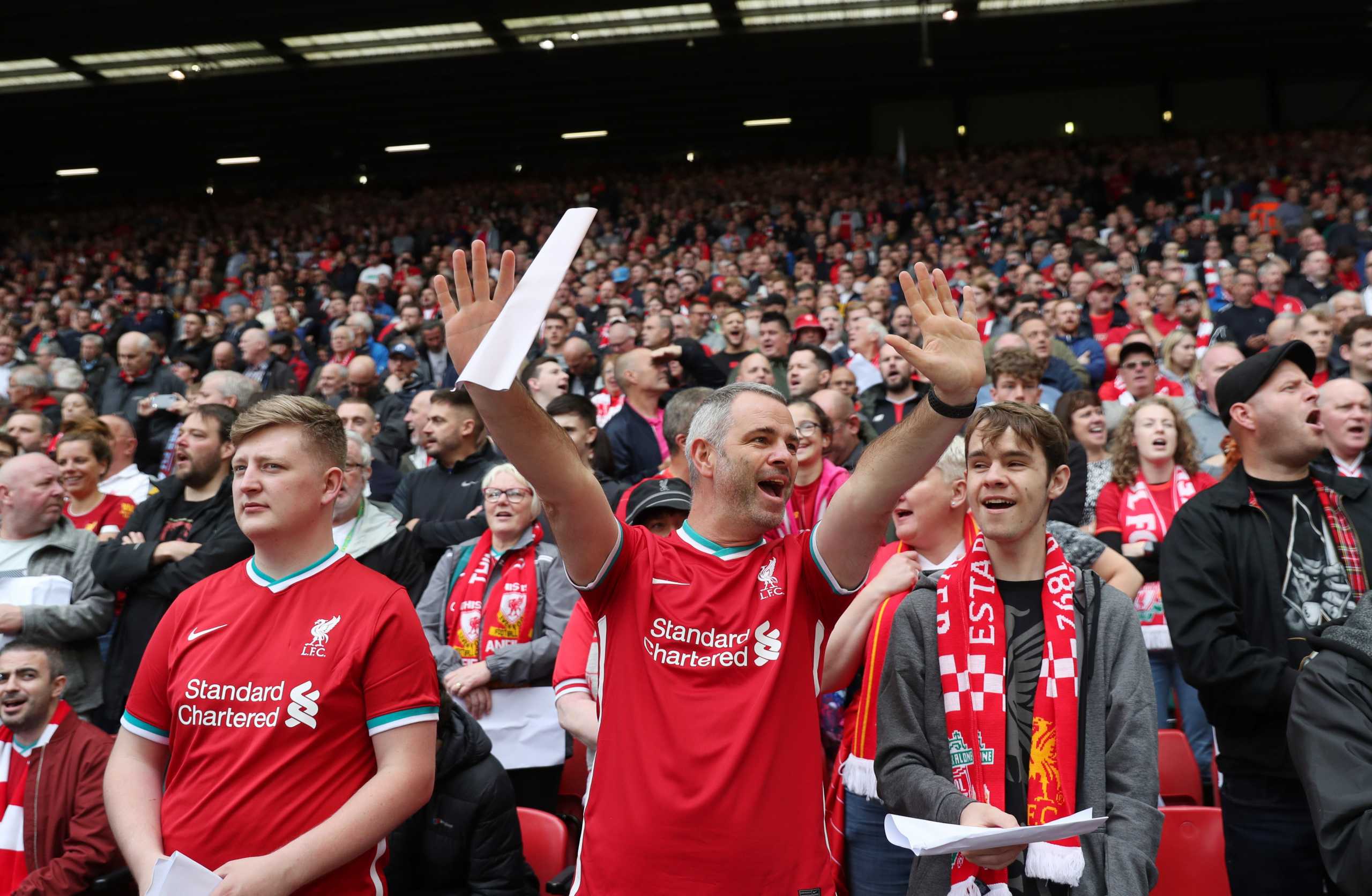 Soccer Football - Premier League - Liverpool v Burnley - Anfield, Liverpool, Britain - August 21, 2021 Liverpool fans inside the stadium before the match REUTERS
