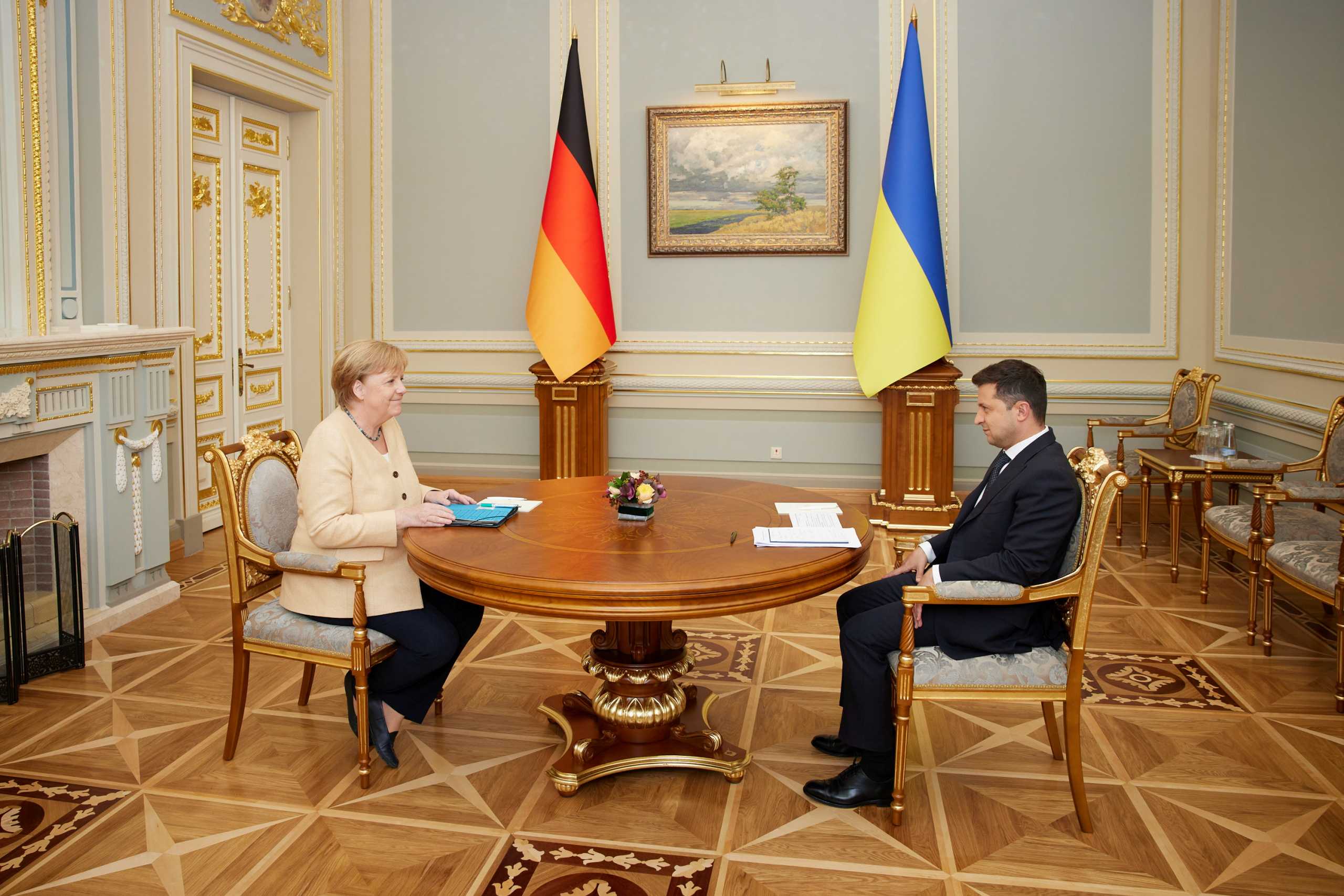 Ukrainian President Volodymyr Zelenskiy attends a meeting with German Chancellor Angela Merkel in Kyiv, Ukraine August 22, 2021. Ukrainian Presidential Press Service