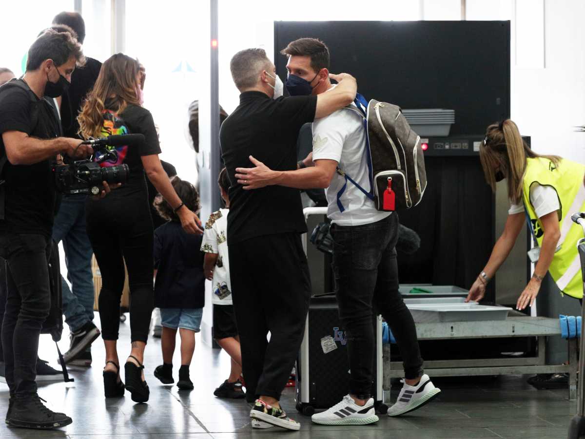 Soccer Football - Lionel Messi leaves FC Barcelona to join Paris St Germain  - Josep Tarradellas Barcelona-El Prat Airport, Barcelona, Spain - August 10, 2021 Lionel Messi is seen at Josep Tarradellas Barcelona-El Prat Airport with his wife Antonela and their children before flying to Paris REUTERS