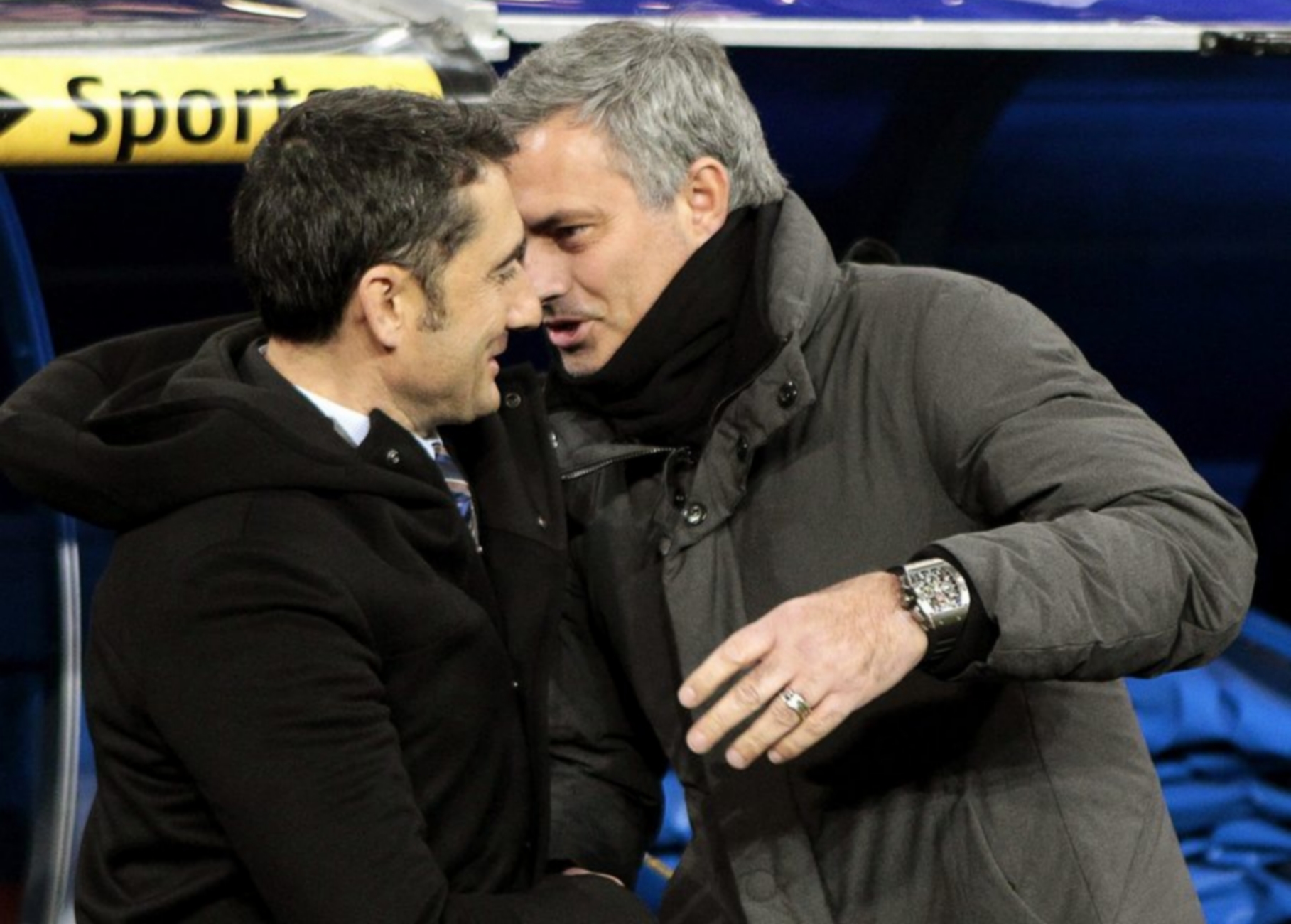 epa03537680 Real Madrid's Portuguese head coach Jose Mourinho (R) greets Valencia's head coach Ernesto Valverde (L) before their Spanish King's Cup quarter final first leg soccer match at Santiago Bernabeu stadium in Madrid, central Spain, 15 January 2013.  EPA