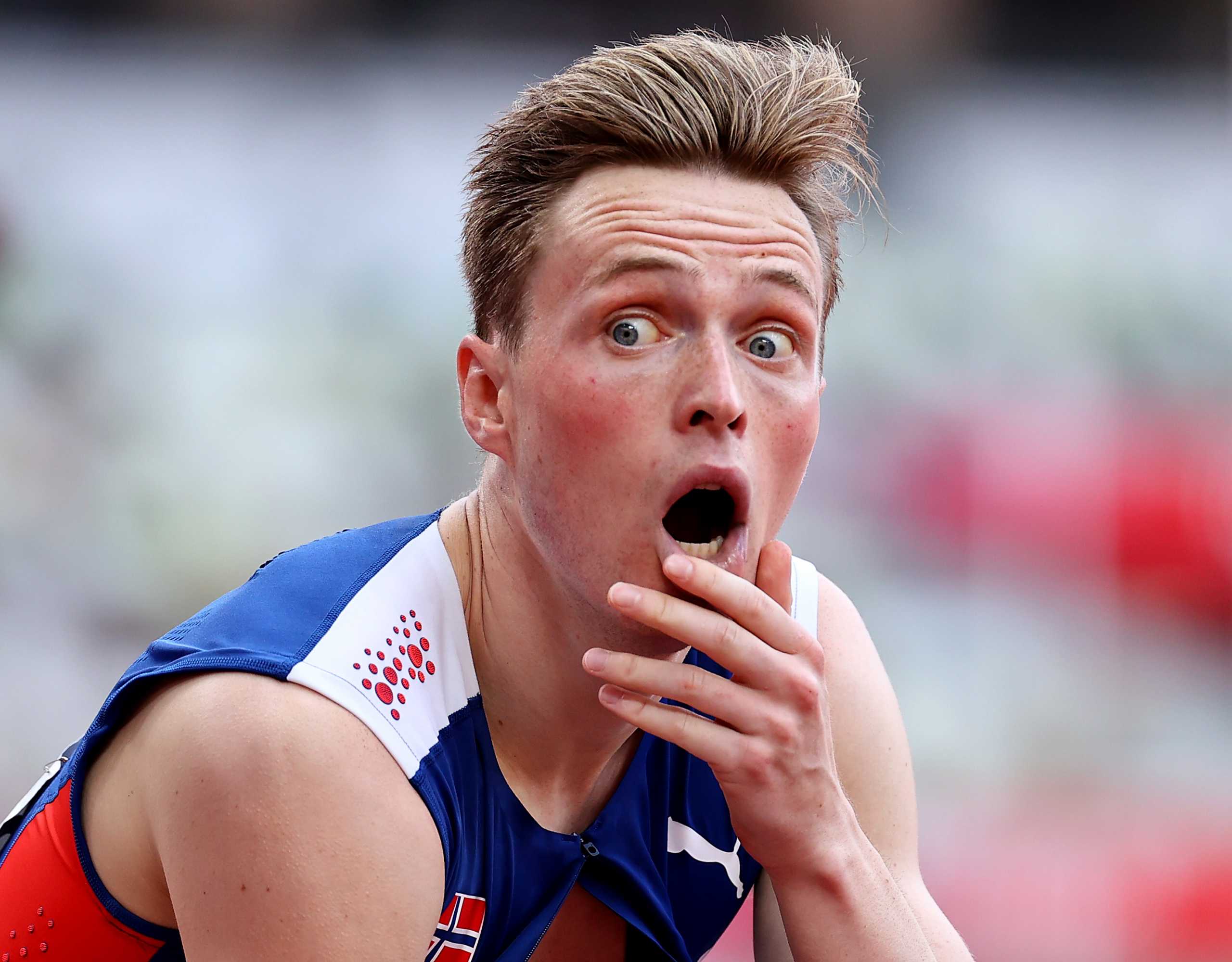 Tokyo 2020 Olympics - Athletics - Men's 400m Hurdles - Final - Olympic Stadium, Tokyo, Japan - August 3, 2021. Karsten Warholm of Norway reacts after crossing the line to win gold and setting a new world record REUTERS