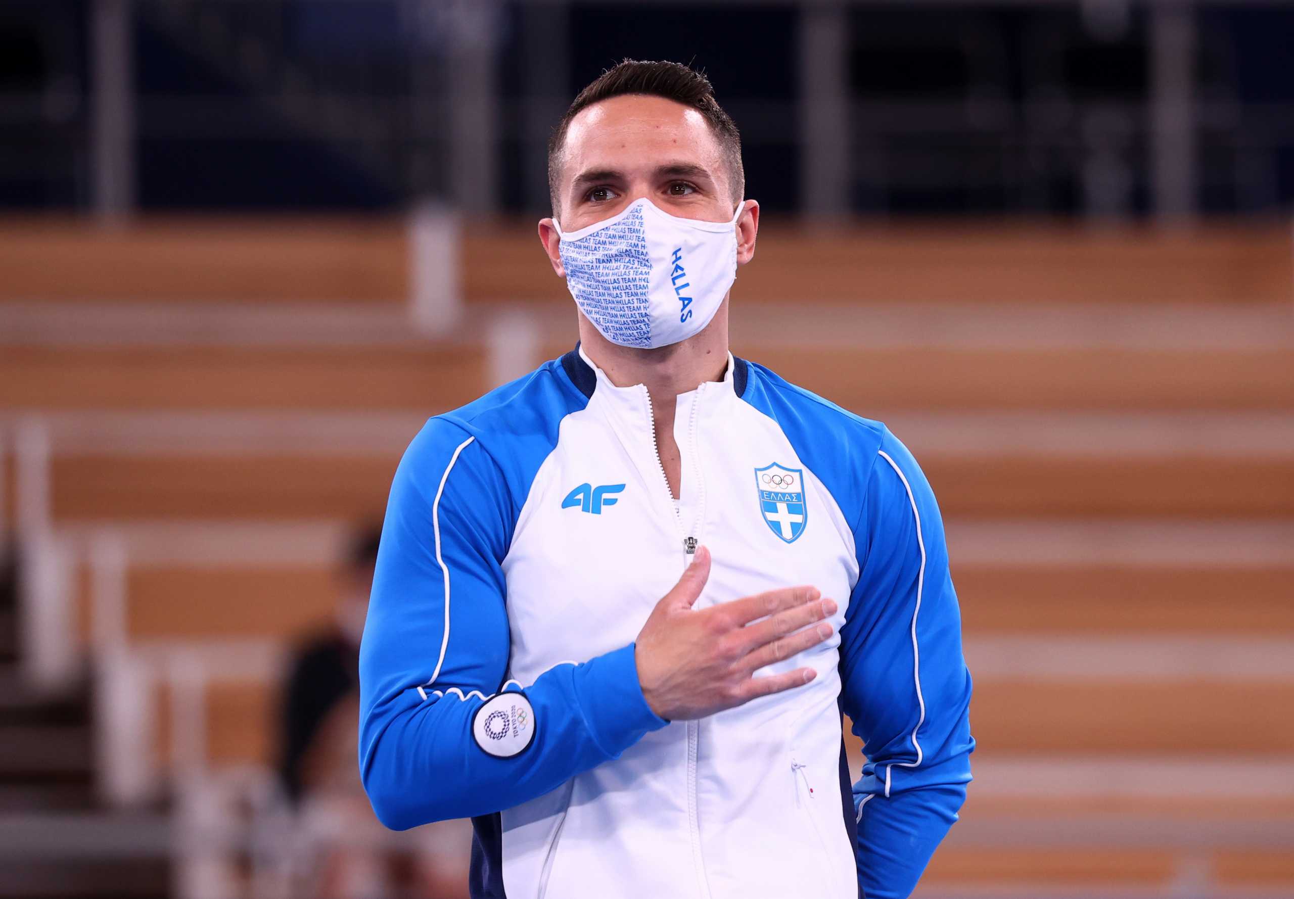 Tokyo 2020 Olympics - Gymnastics - Artistic - Men's Rings - Medal Ceremony - Ariake Gymnastics Centre, Tokyo, Japan - August 2, 2021.  Bronze medallist Eleftherios Petrounias of Greece wearing a protective face mask stands on the podium. REUTERS